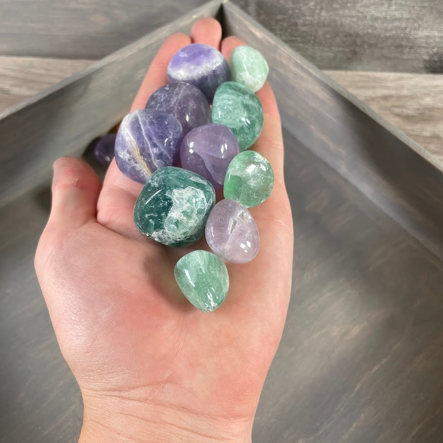 **Colorful fluorite tumbled stones with natural polished crystal patterns for wholesale gemstone and mineral collections**