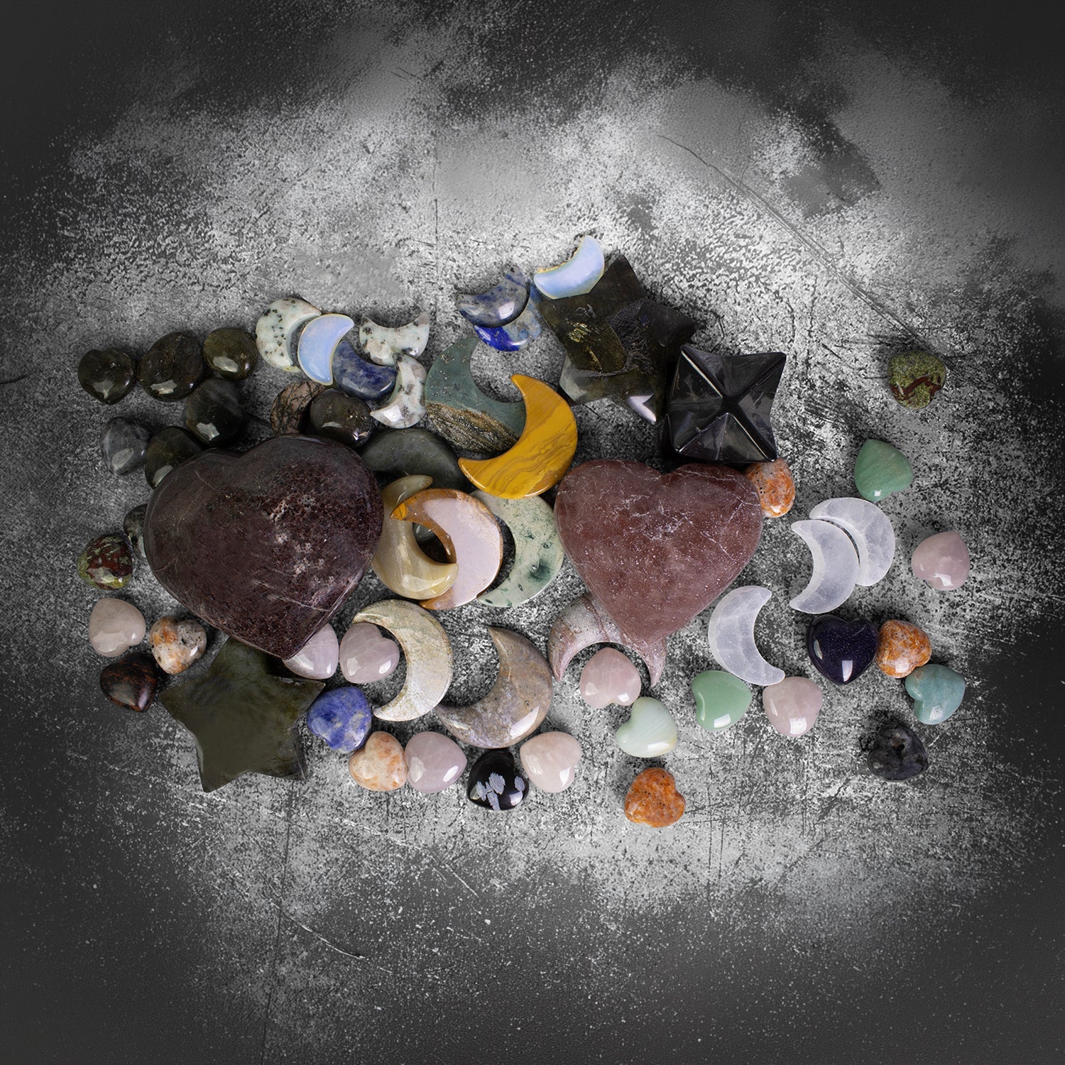 Wholesale gemstone stars, moons, and hearts in assorted polished crystals for metaphysical shops, boutiques, gift displays, and crystal retailers