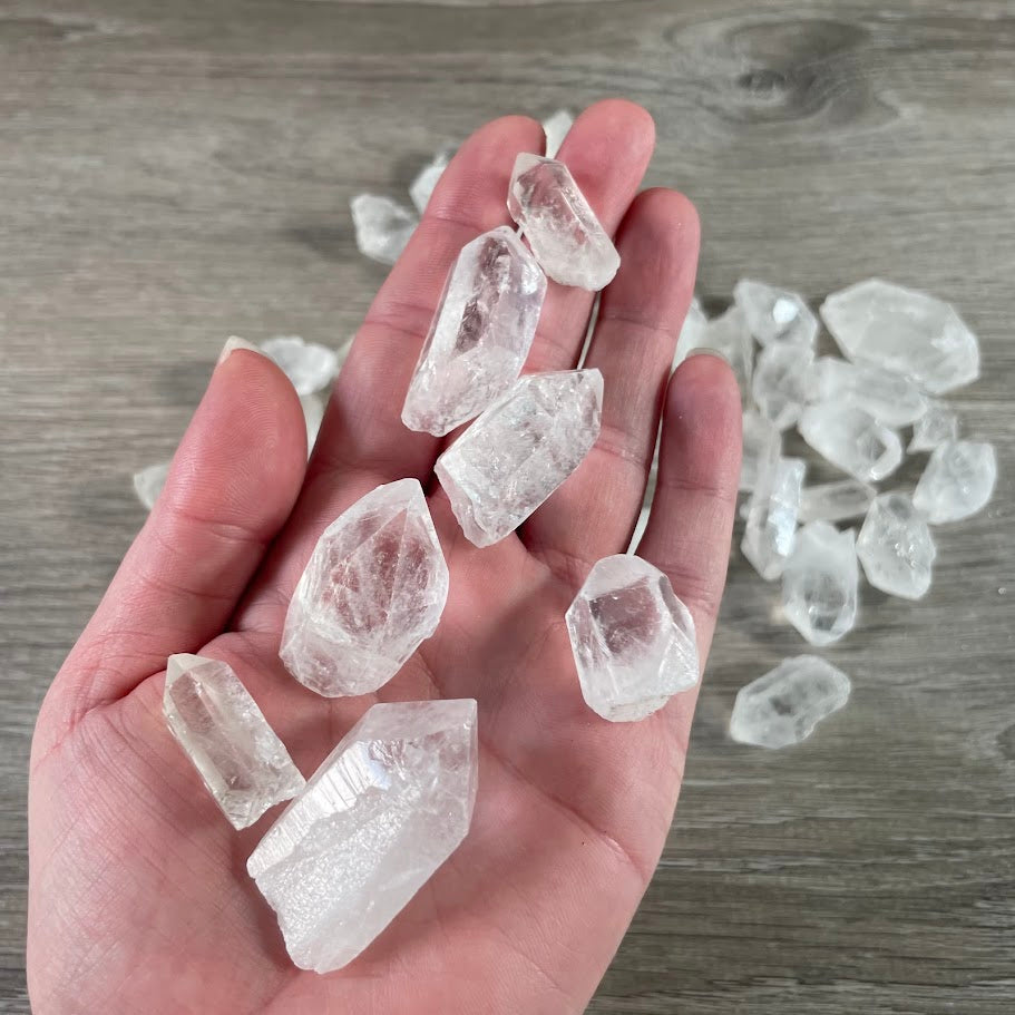 **Clear quartz points with natural transparent crystal shape for wholesale gemstone and mineral collections**