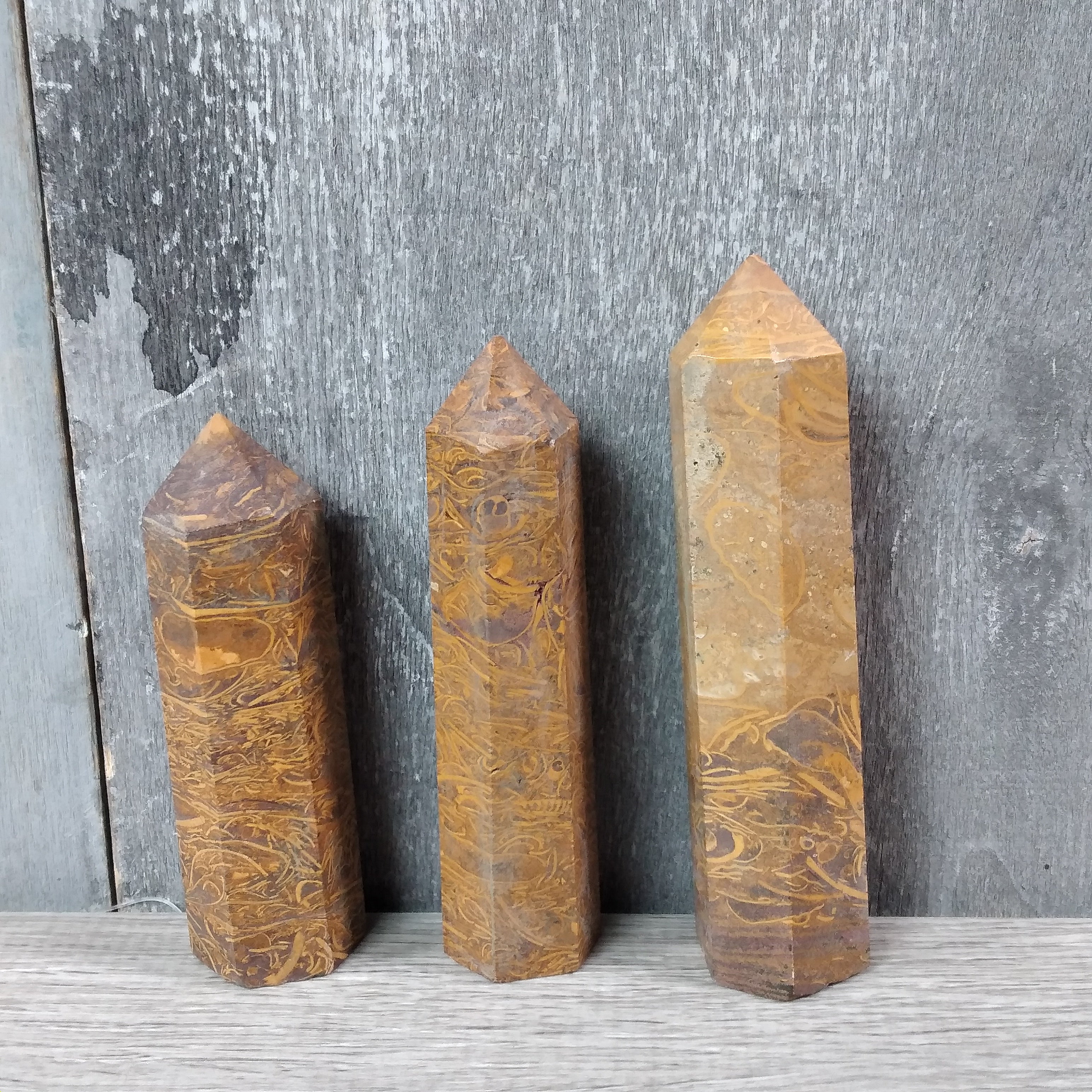 calligraphy stone earthy obelisk decor