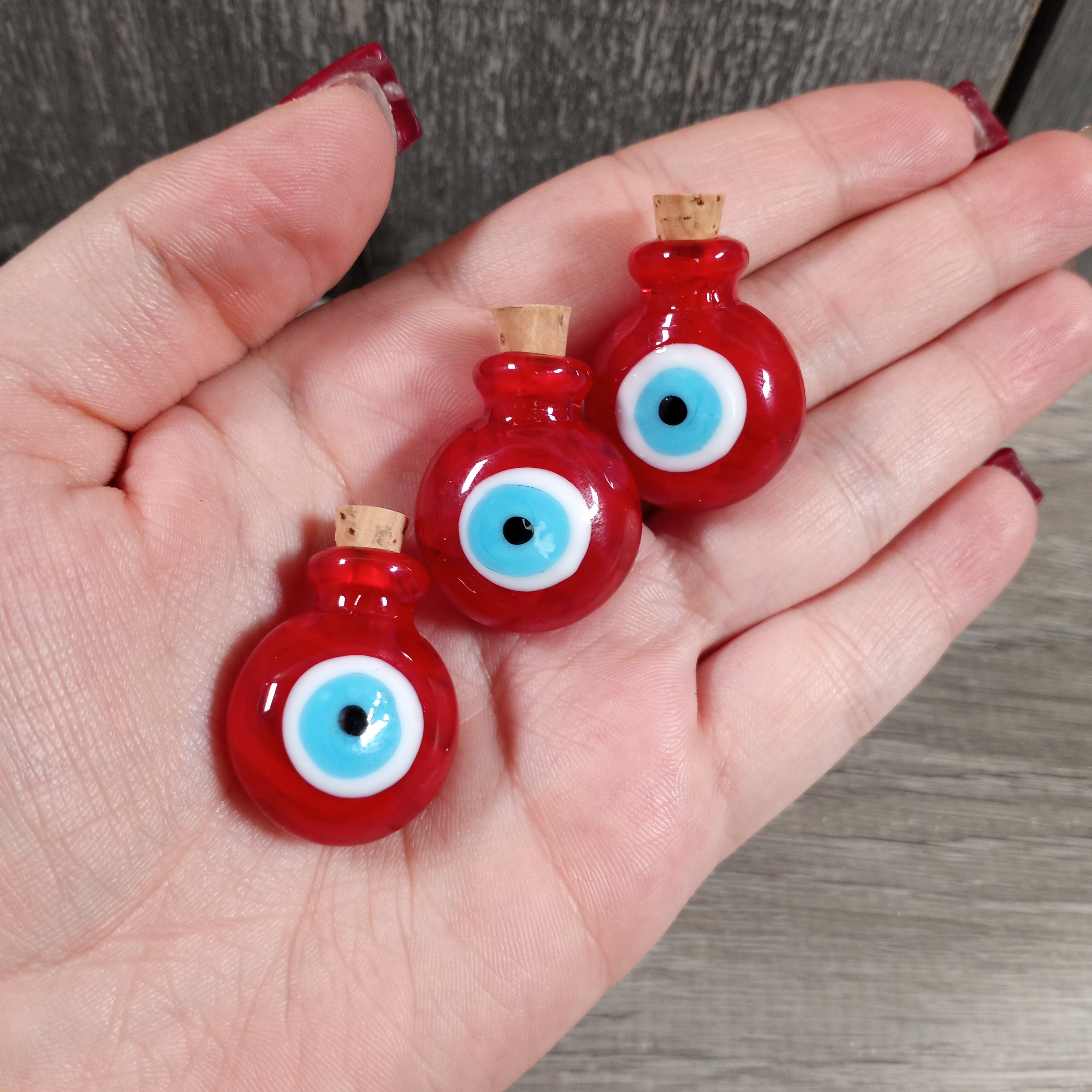 red evil eye stash bottles for new age stores