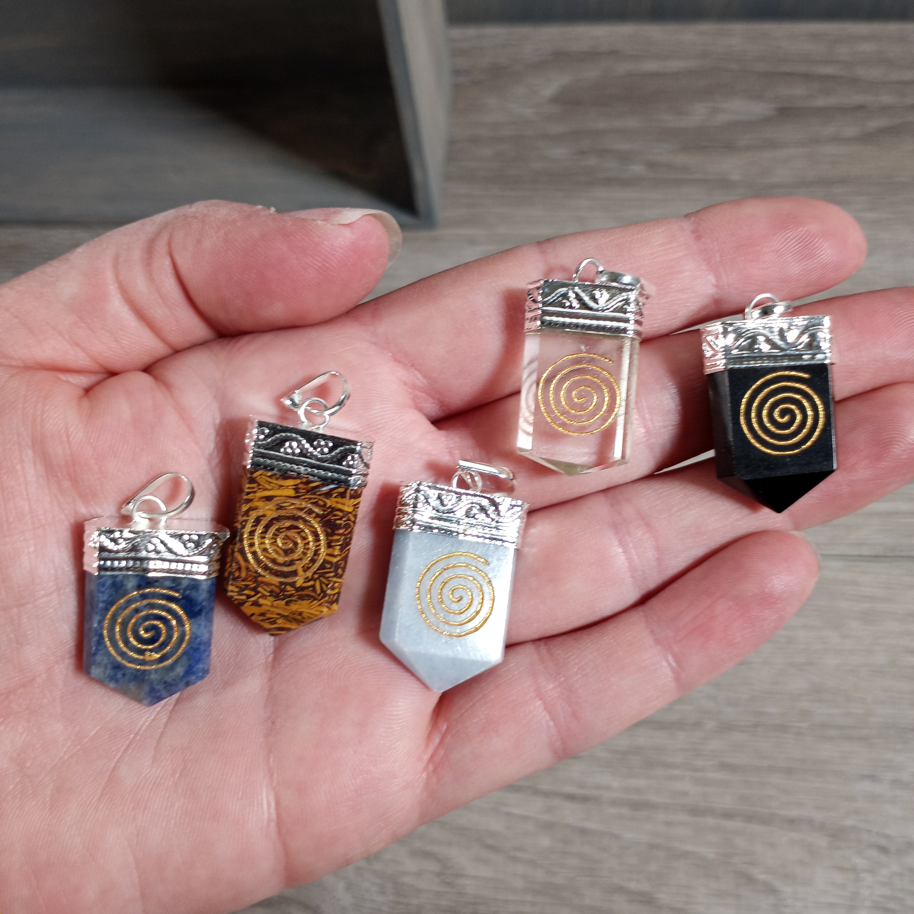 Etched spiral Goddess pendants.