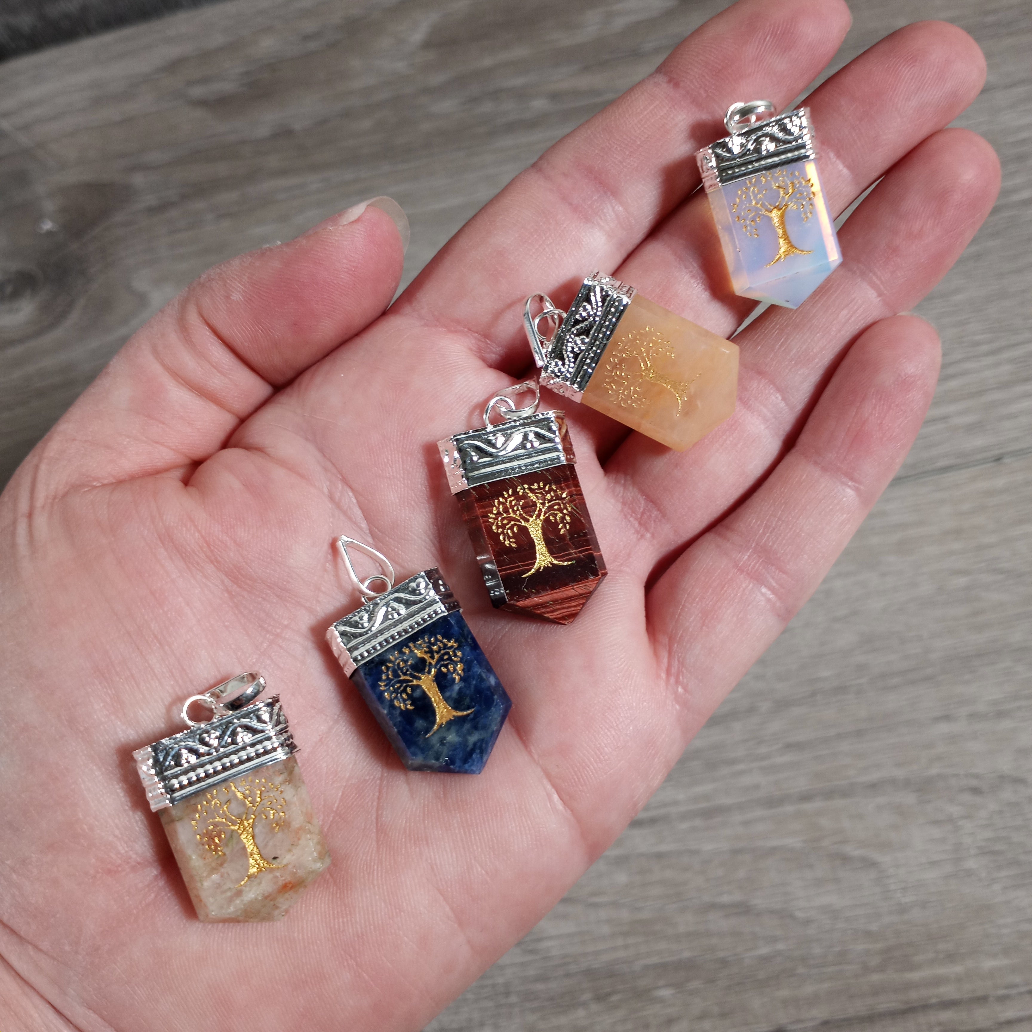 Etched gemstone pendants in silver pot metal perfect for boho jewelry retailers.