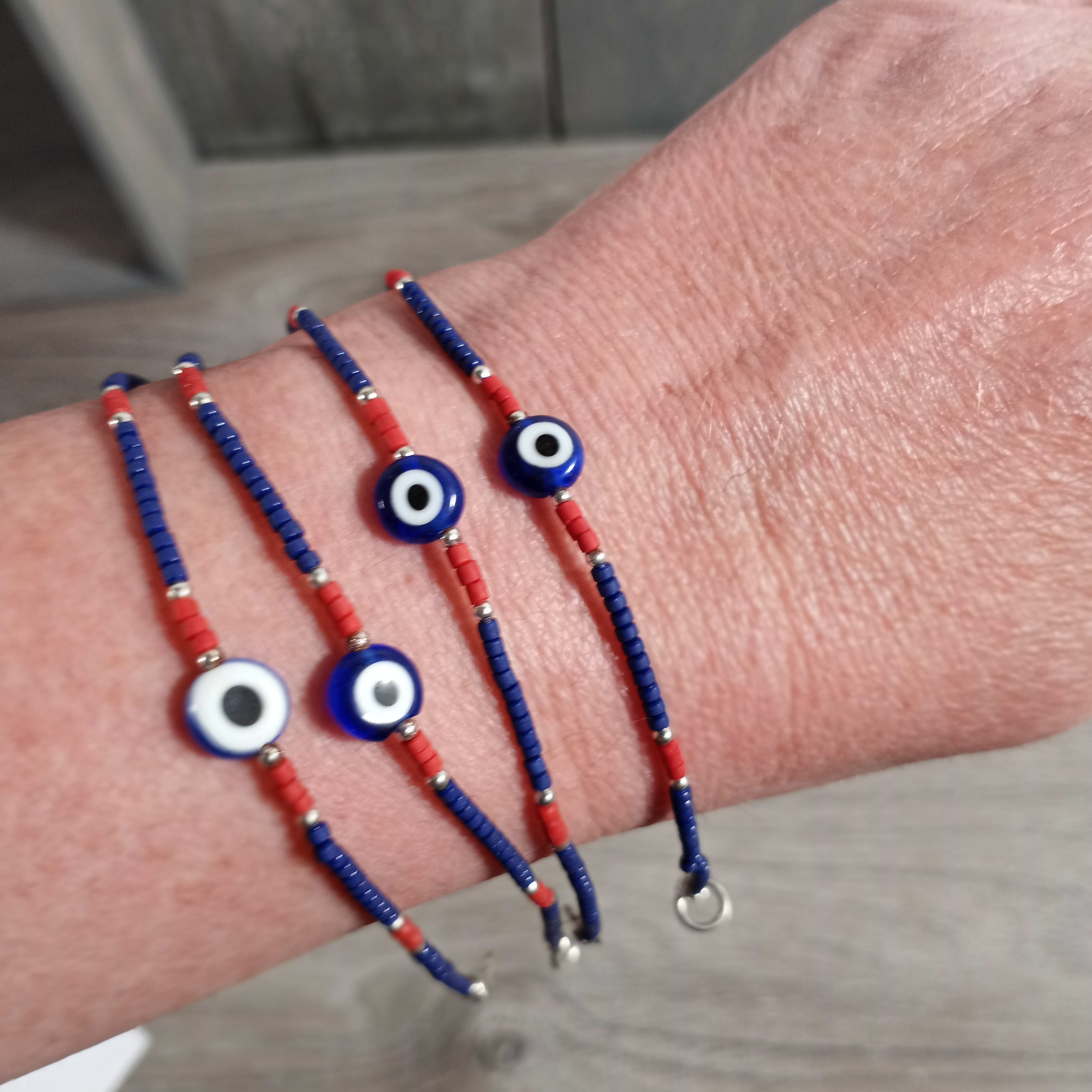 Wooden Beaded Bracelet with Lobster Claw Clasp and Evil Eye Charm