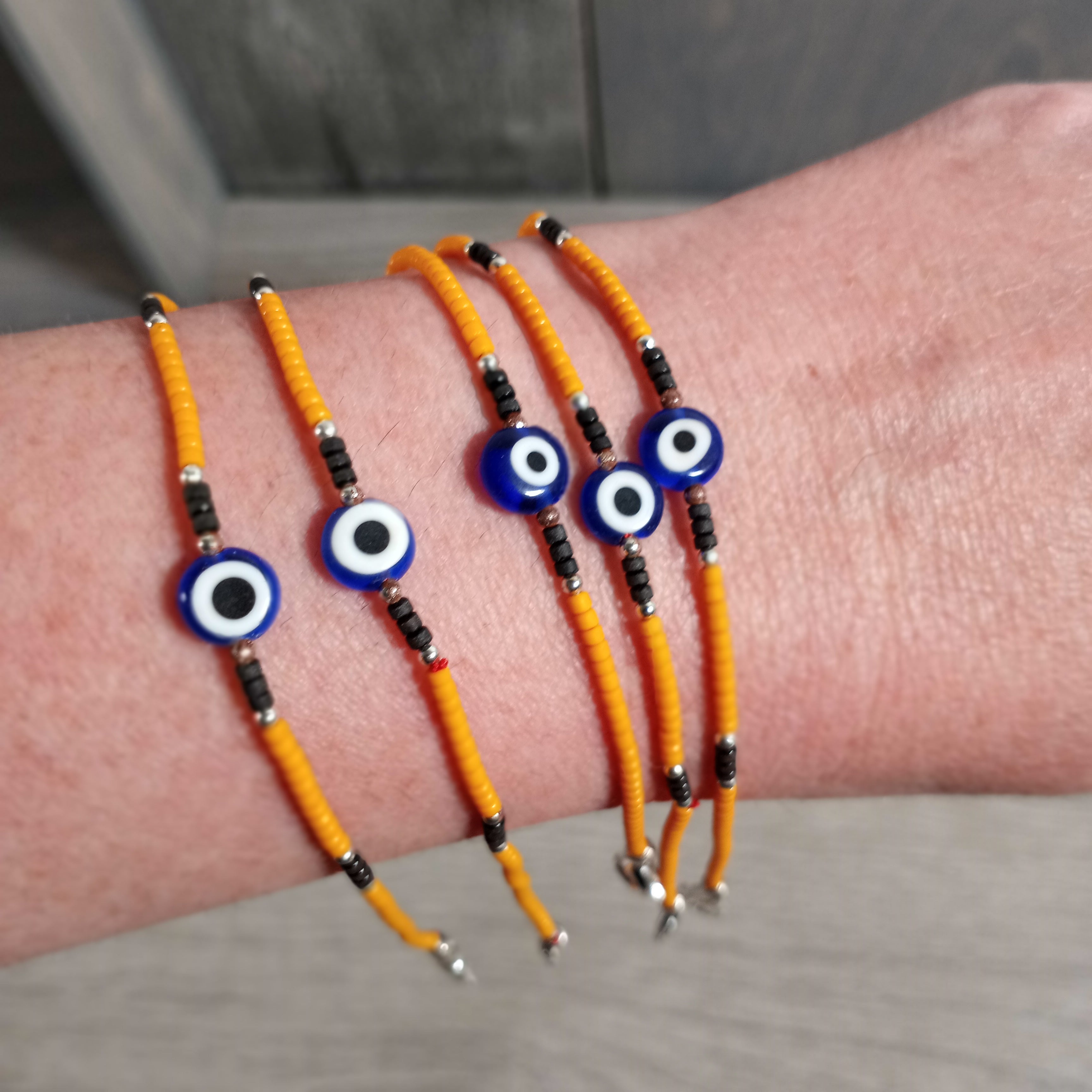 Wooden Beaded Bracelet with Lobster Claw Clasp and Evil Eye Charm