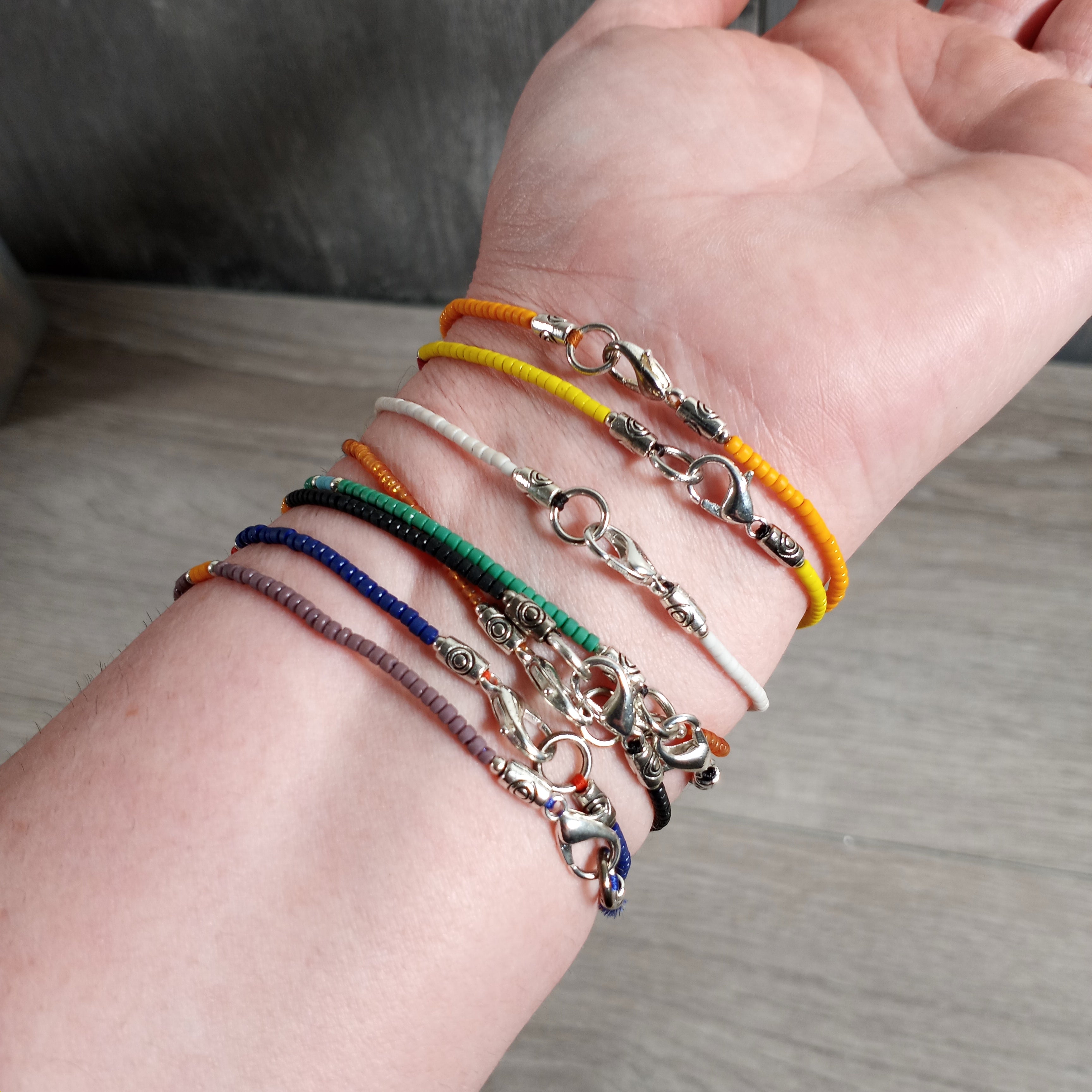 Wooden Beaded Bracelet with Lobster Claw Clasp and Evil Eye Charm