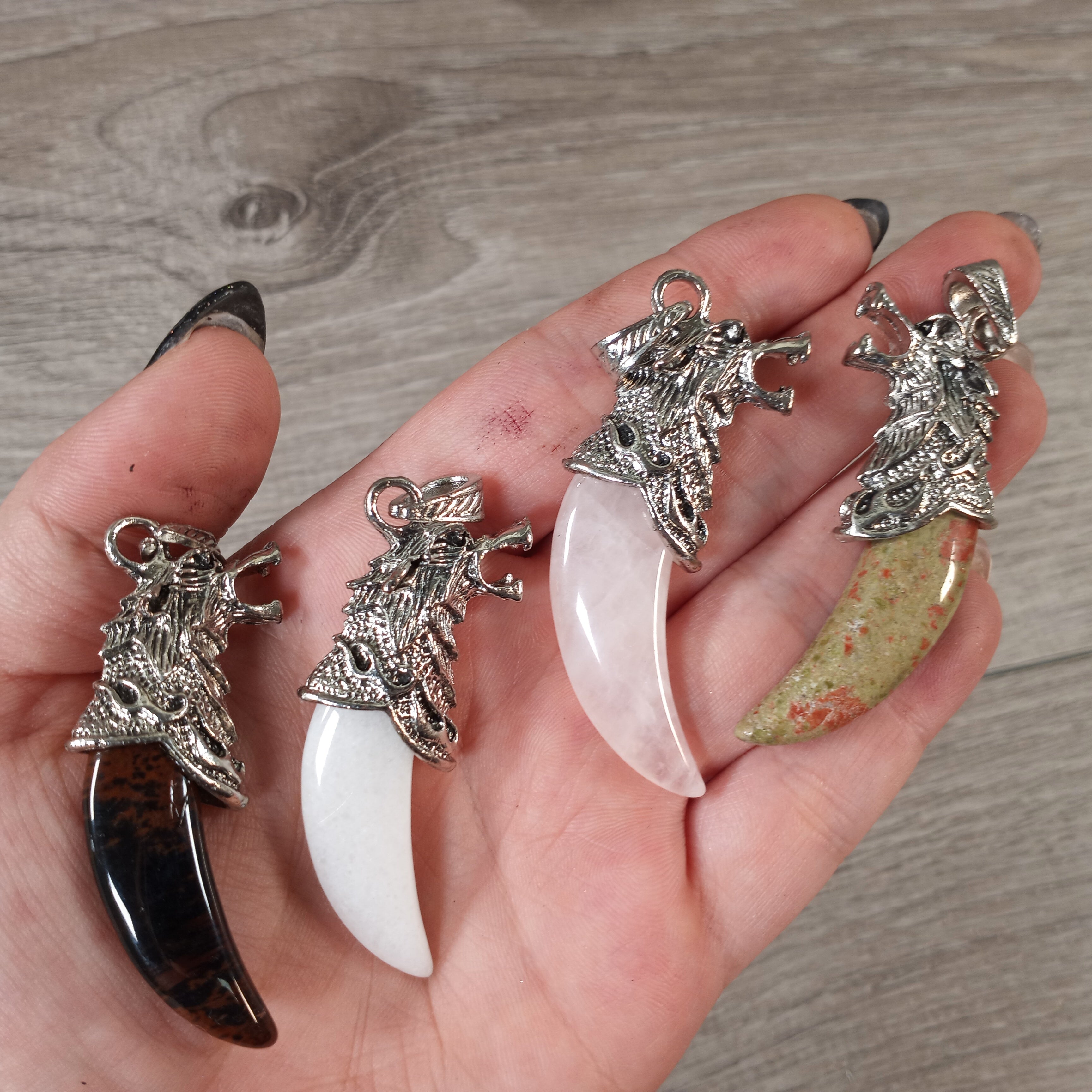 Assorted crystal wolf pendants for wholesale jewelry shops