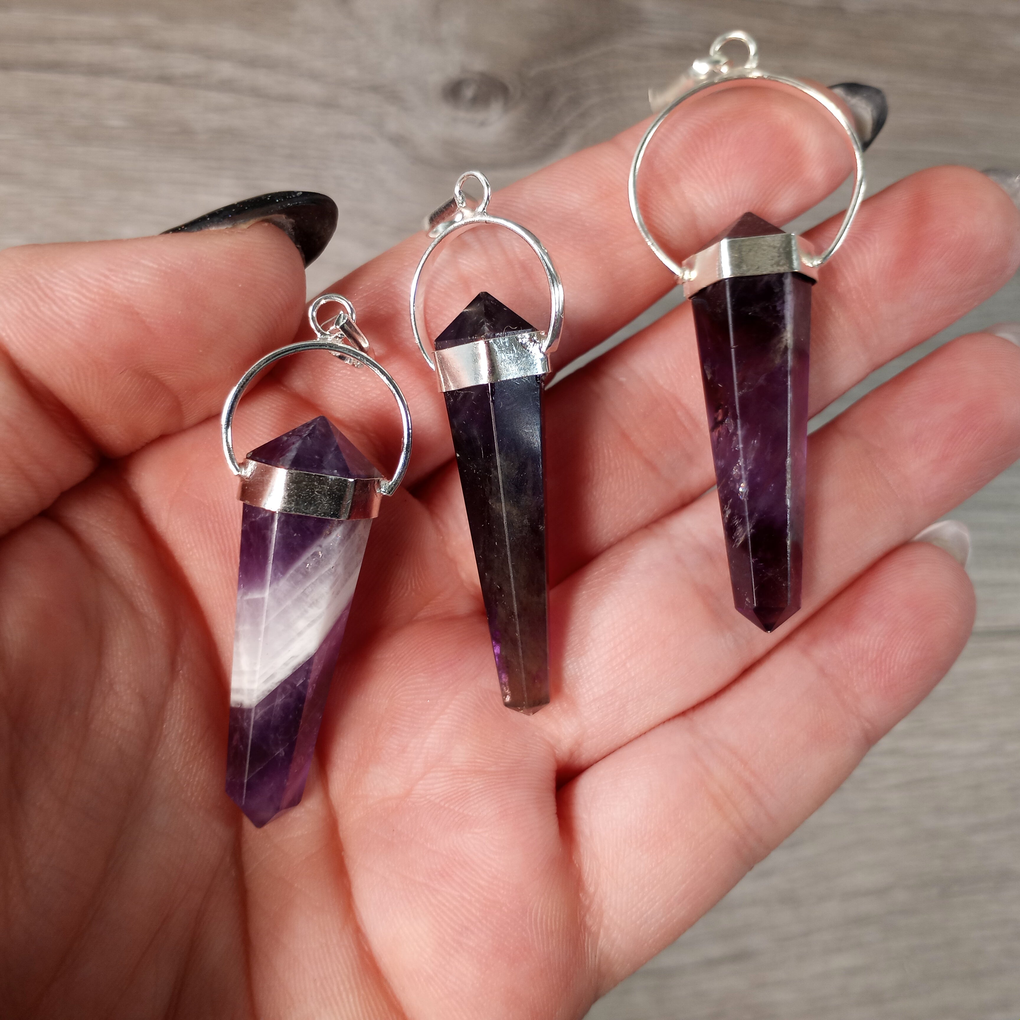 Amethyst point pendants for energy work and new age stores