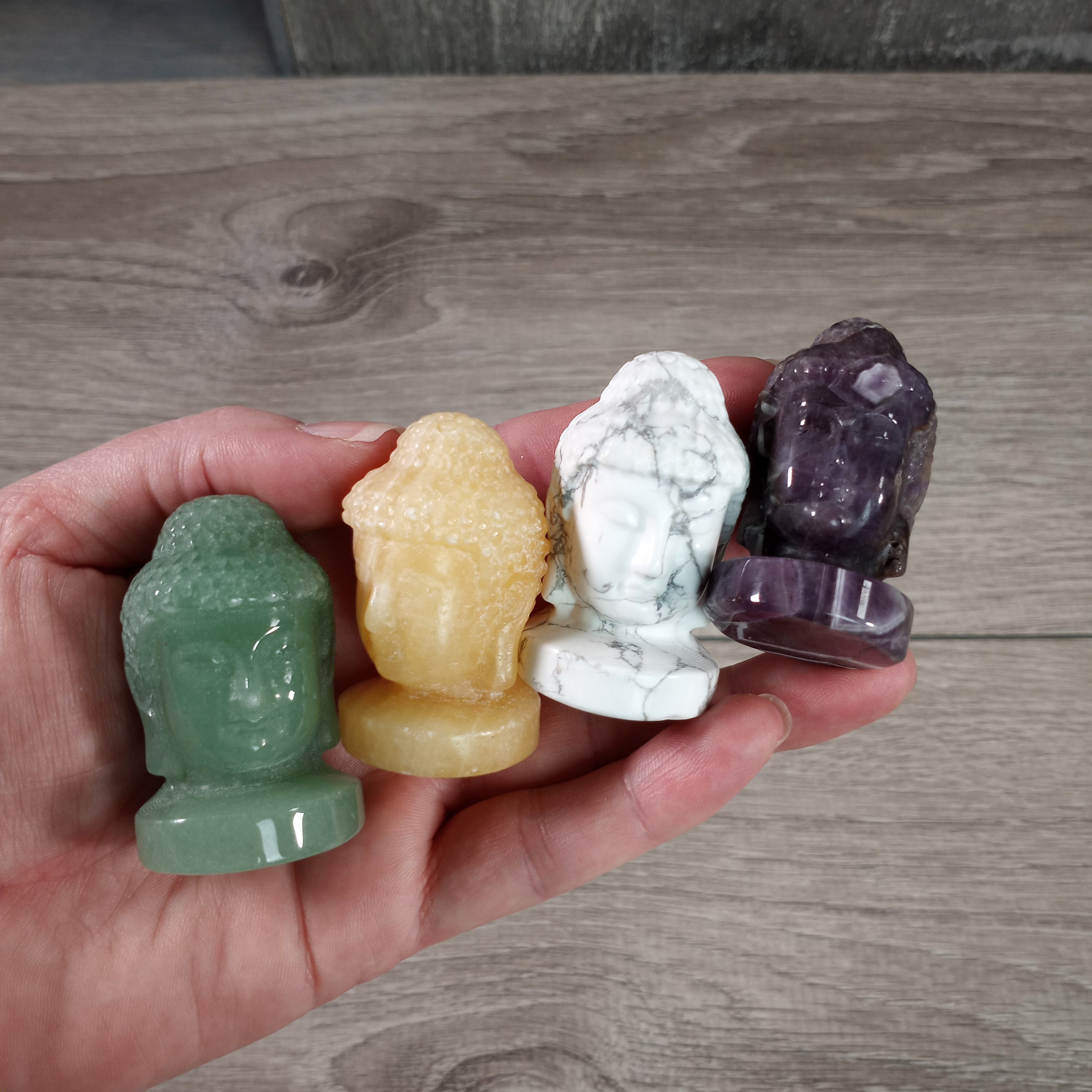 assorted gemstone Buddha heads for retail stores