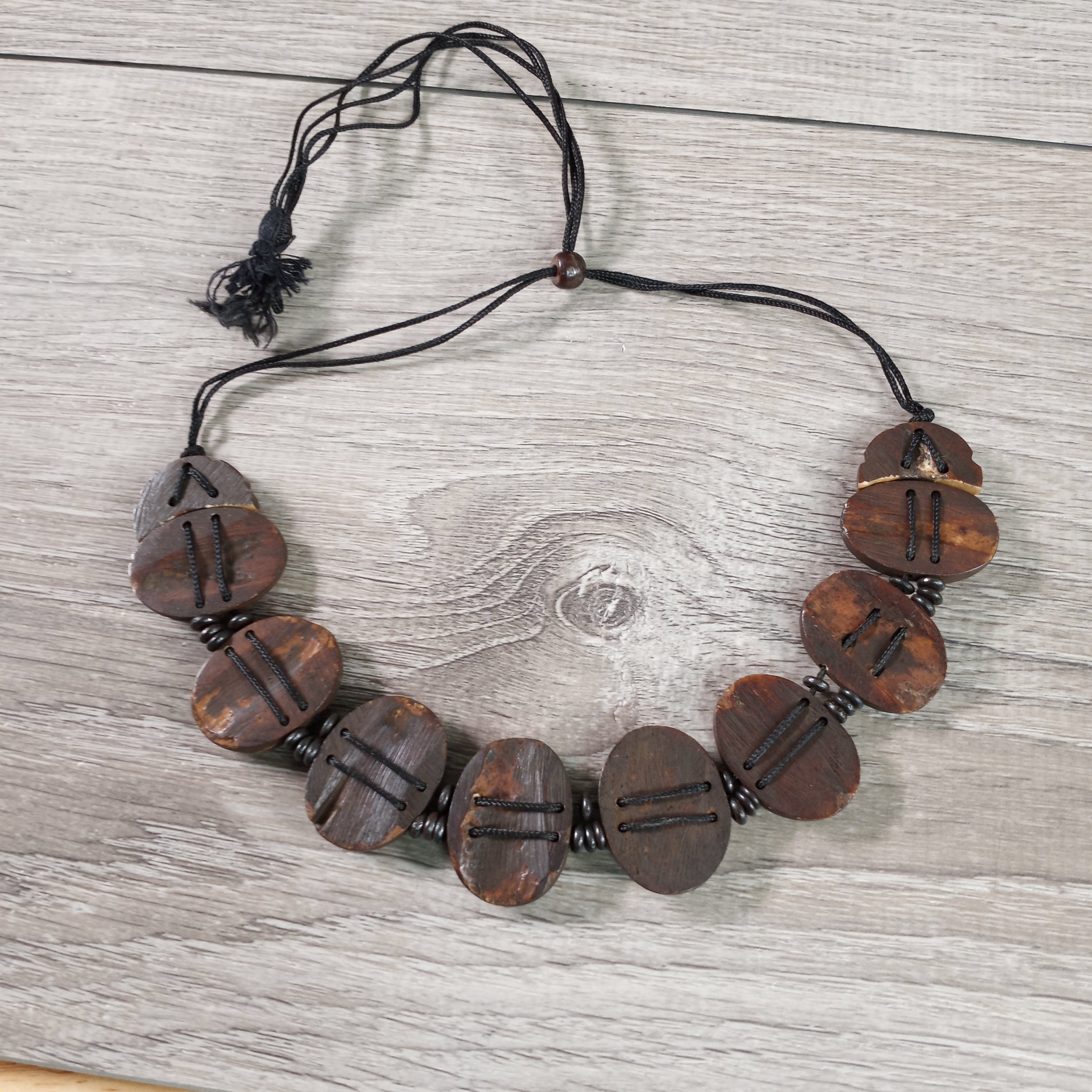 Bone Necklace Featuring Eight Auspicious Symbols - Buddhism