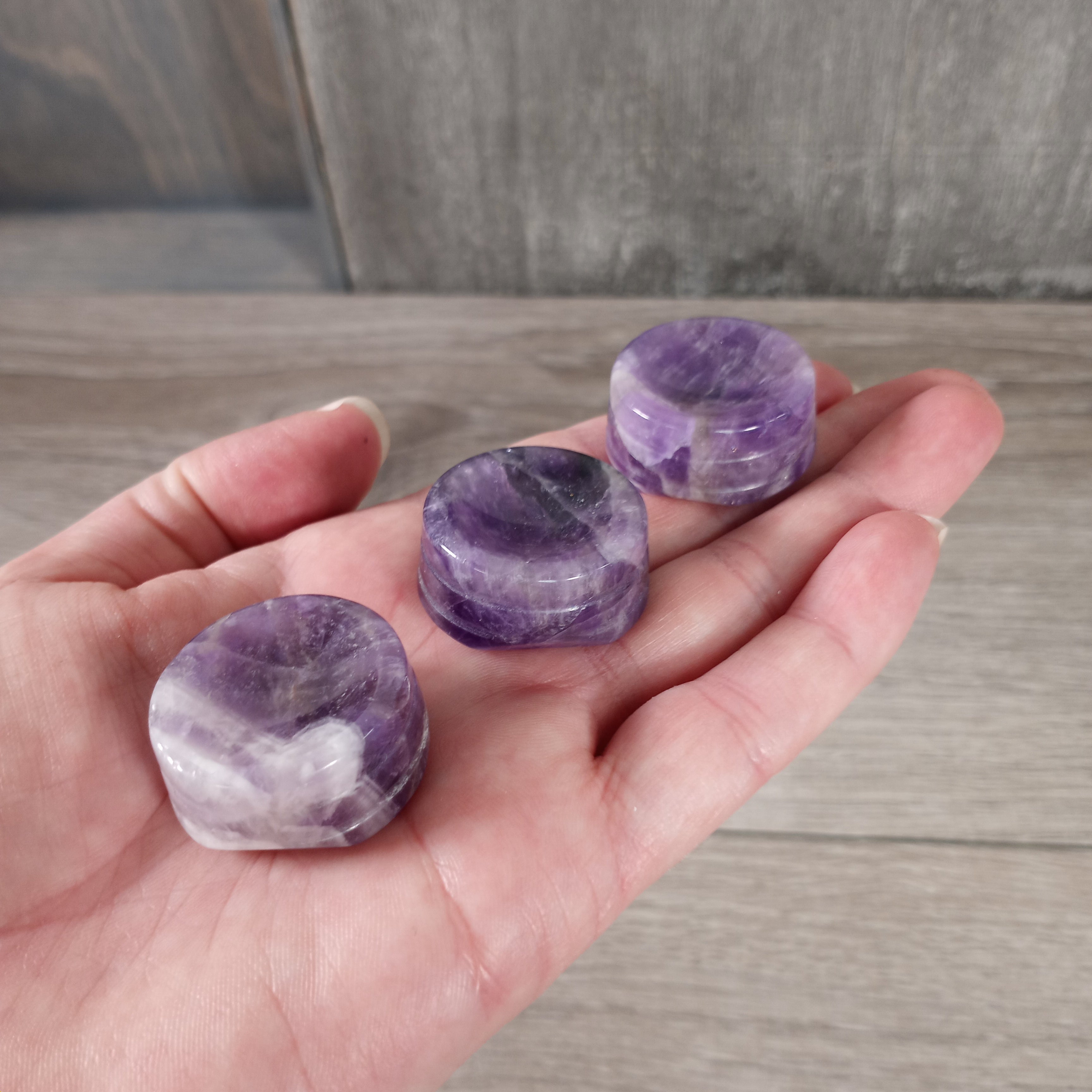 Amethyst crystal stand for gemstone spheres and mineral orbs