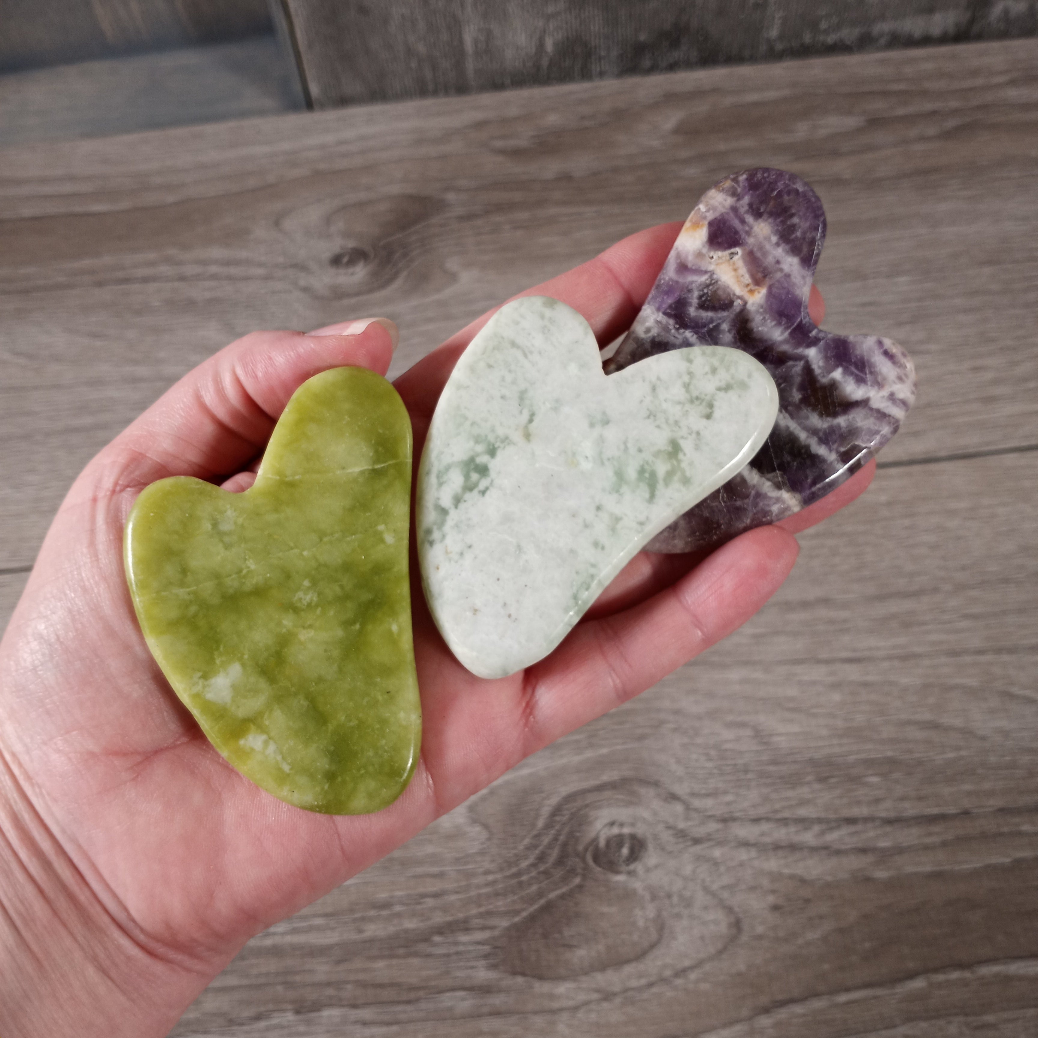 Assorted crystal Gua Sha tools for face massage retail display