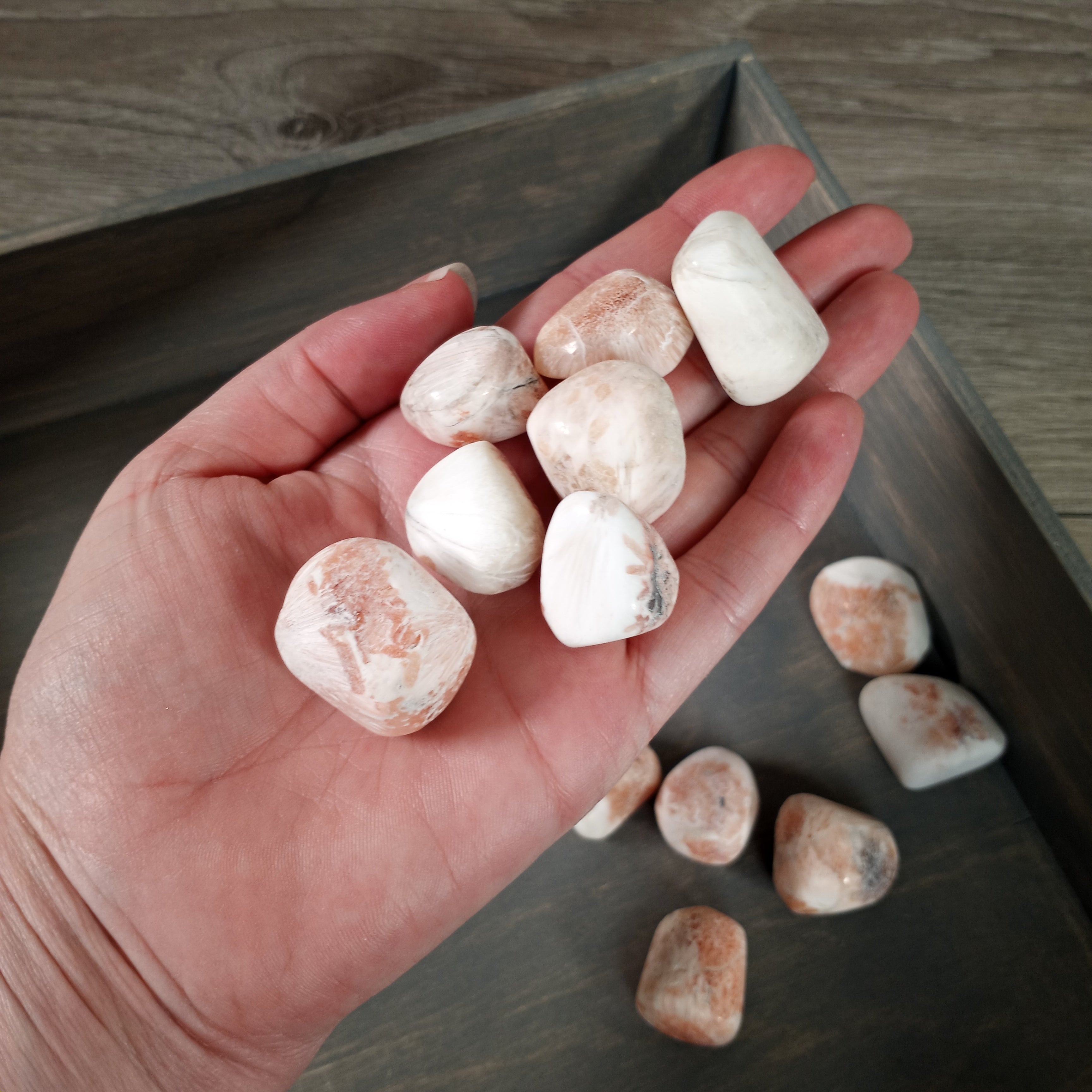 Tumbled peach scolecite wholesale stones.
