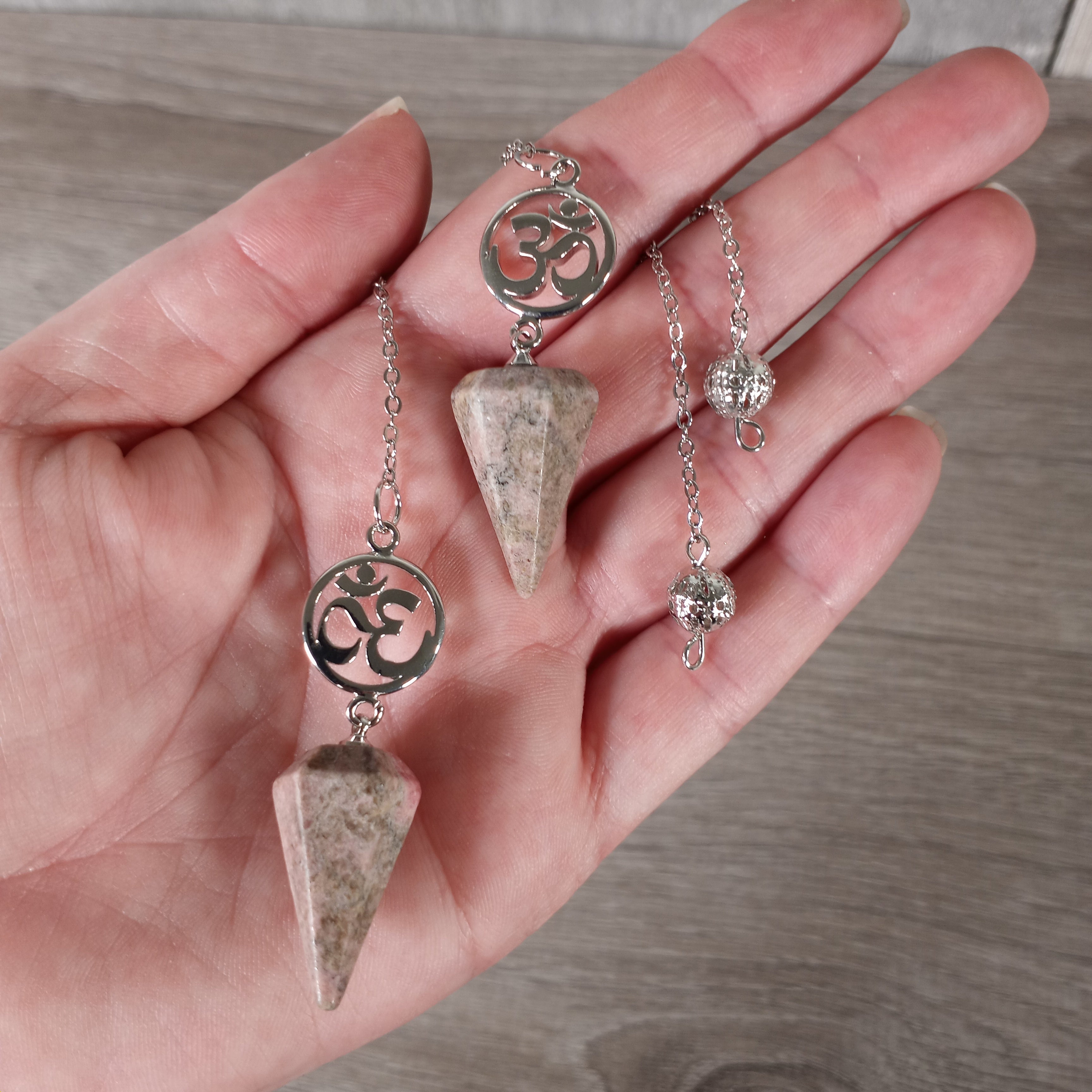 Rhodonite Aum symbol Reiki pendulum for spiritual divination