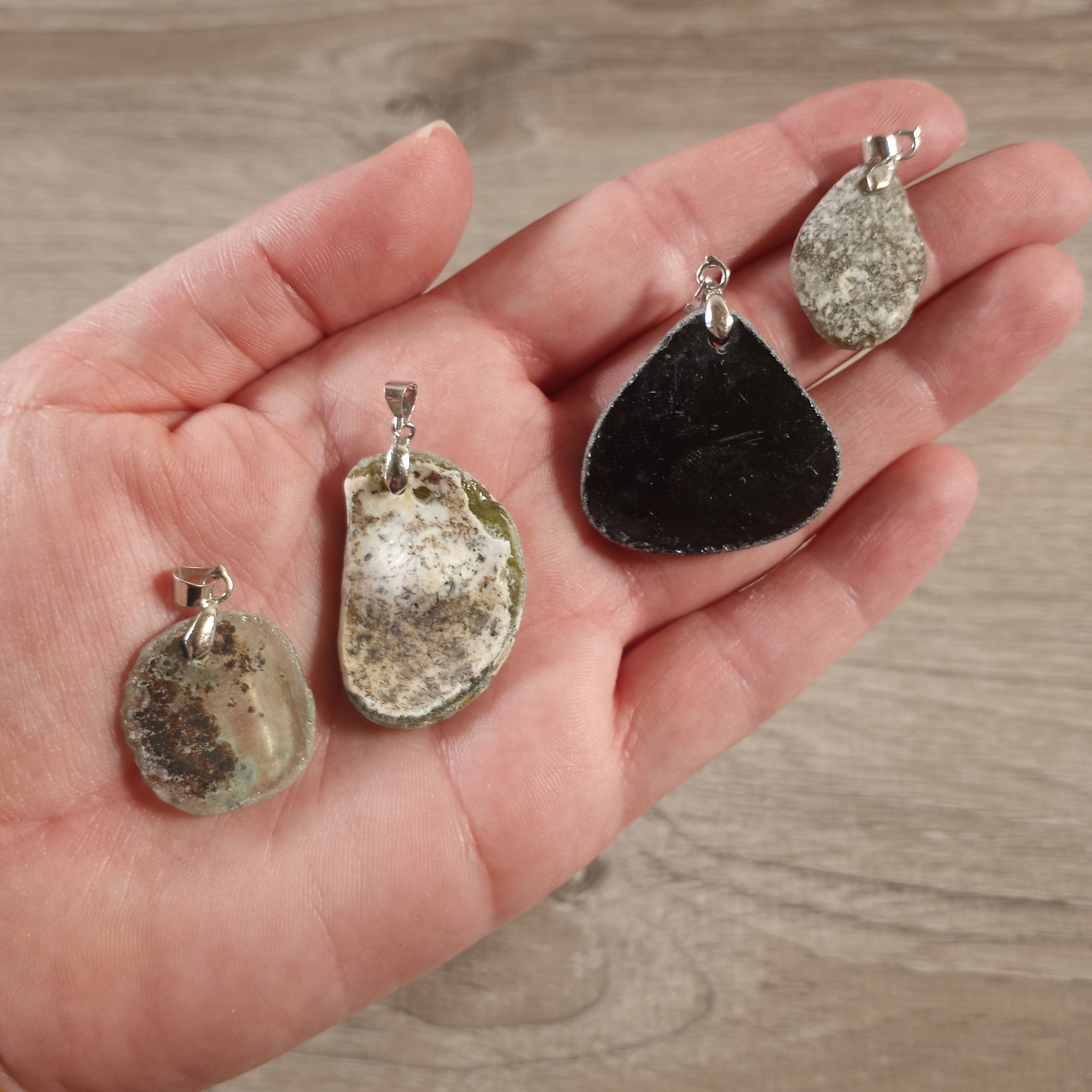 Roman glass pendant displaying multicolored, tones