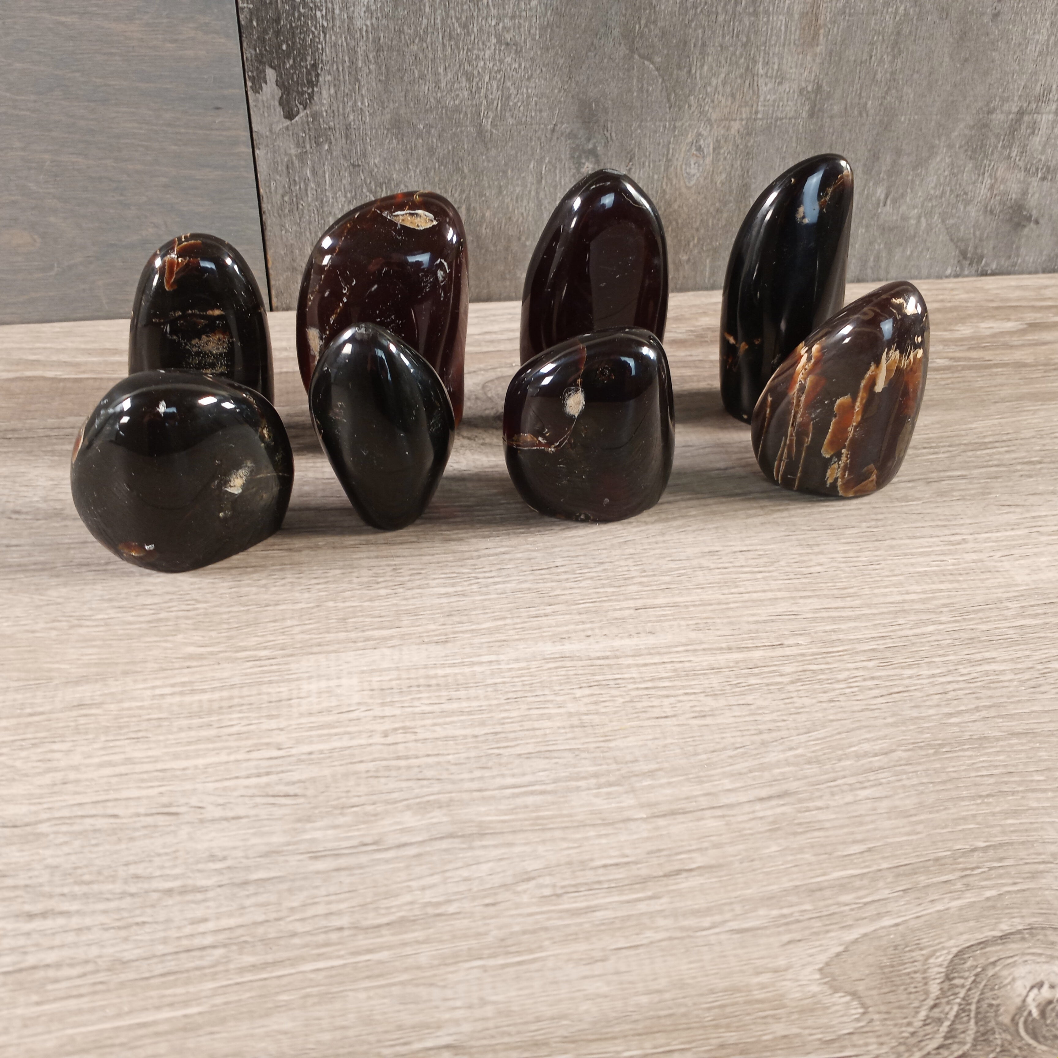 Polished Black Amber Freeform stone from Indonesia - bulk