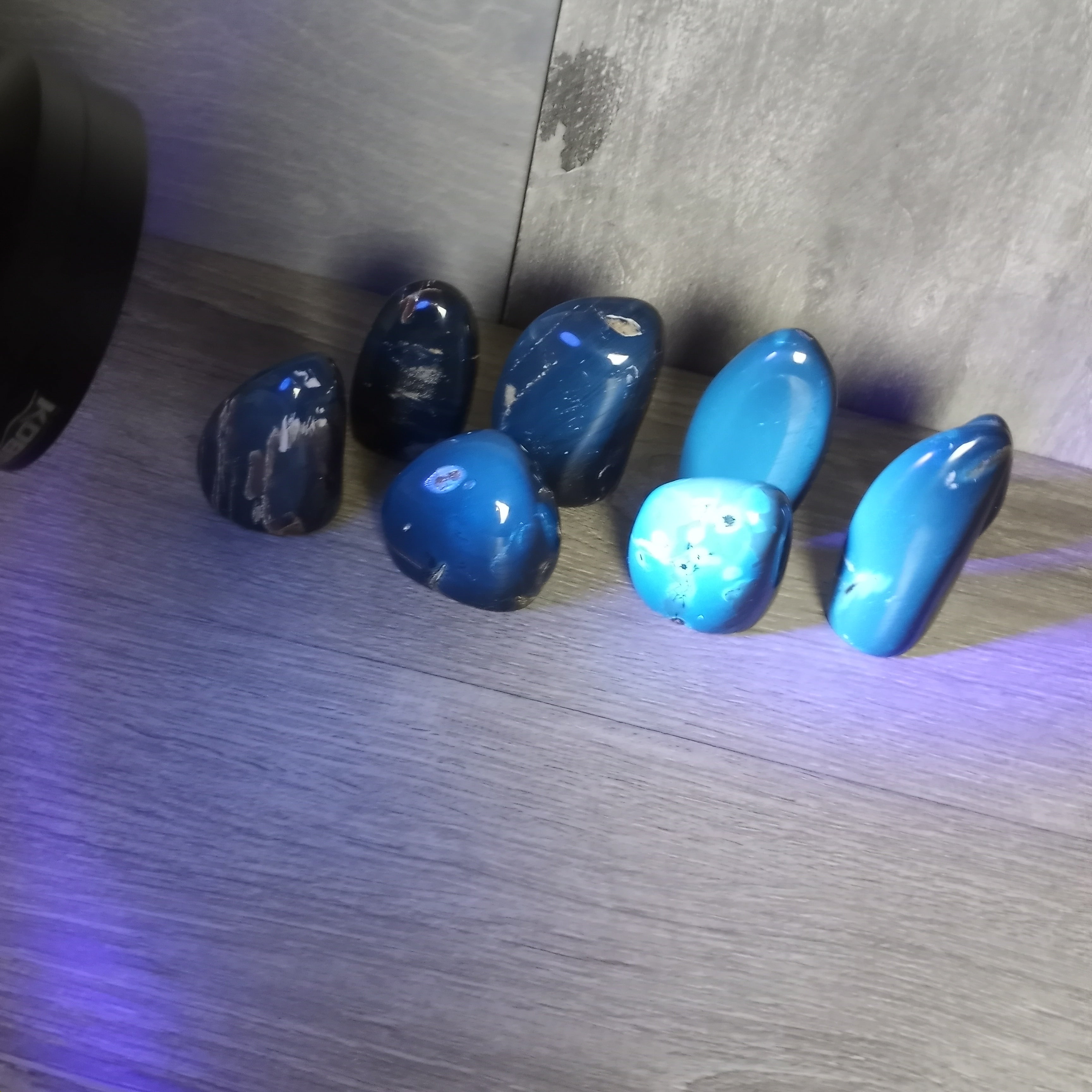 Black amber with black light glow.