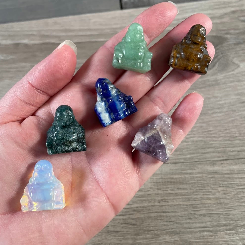 Assorted Crystal Buddha figurines for spiritual shops