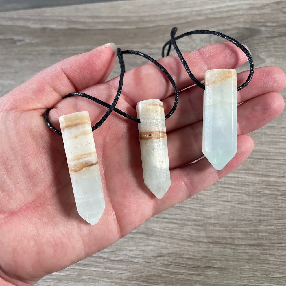 Caribbean Calcite pendant necklace on adjustable black cord for men