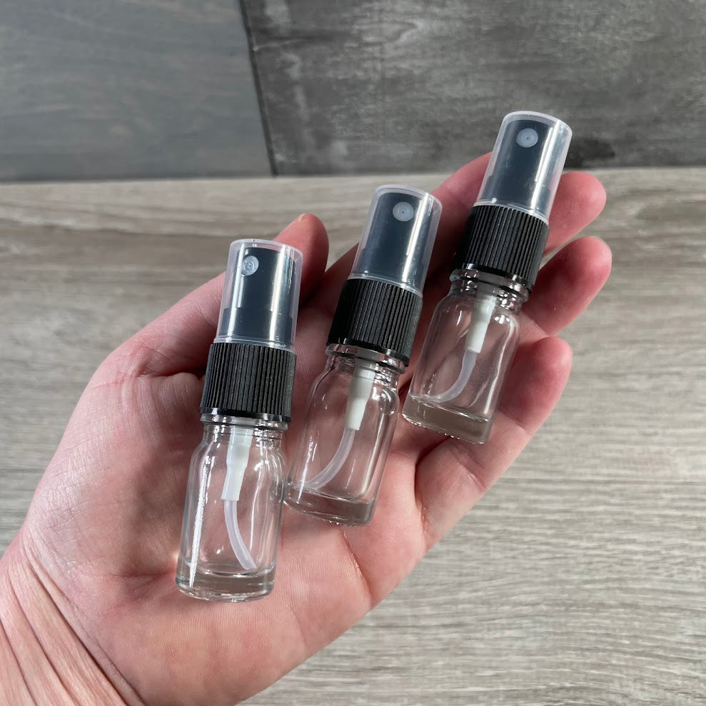 Small glass spray bottle for crystal cleansing sprays and wellness shops