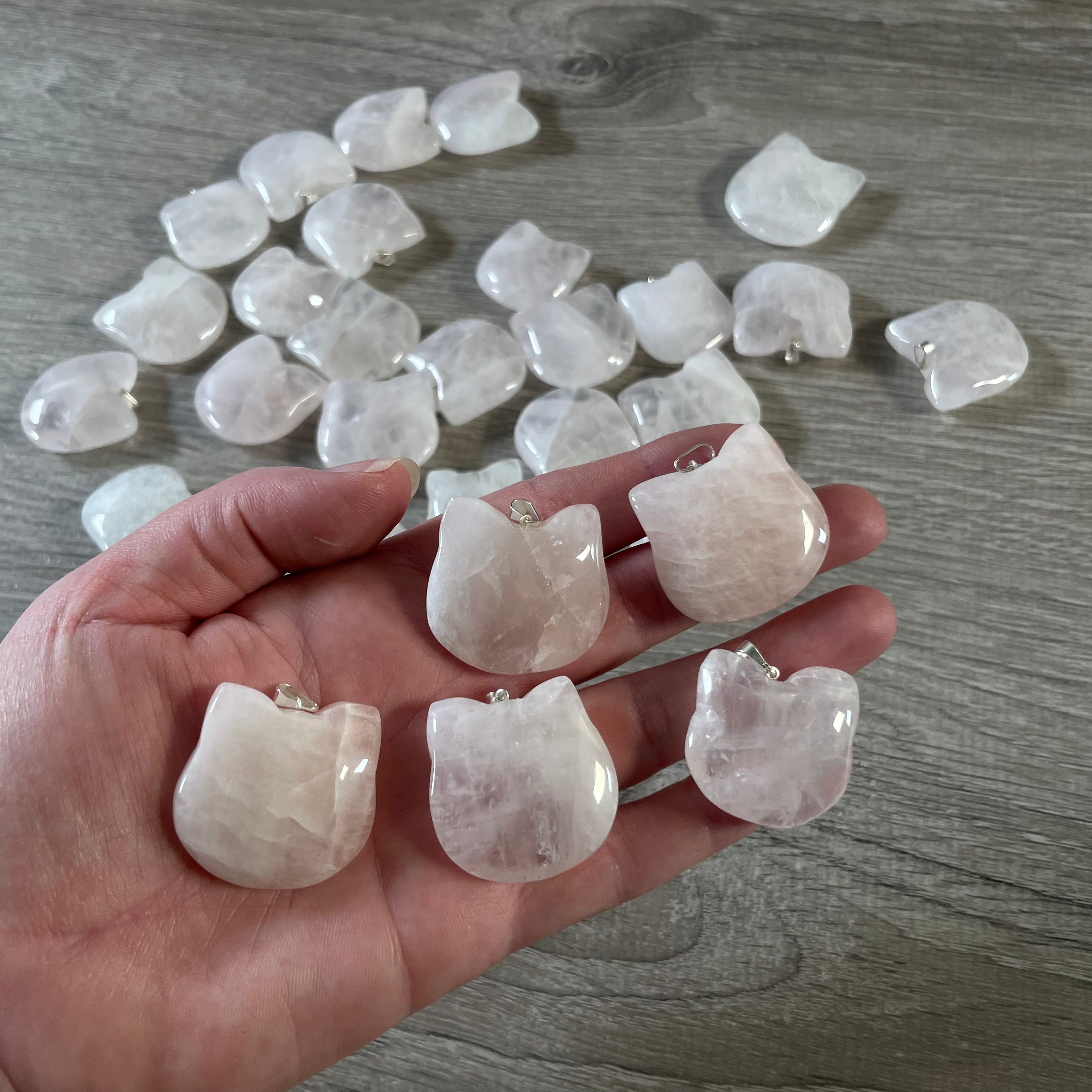 Rose quartz feline crystal pendant