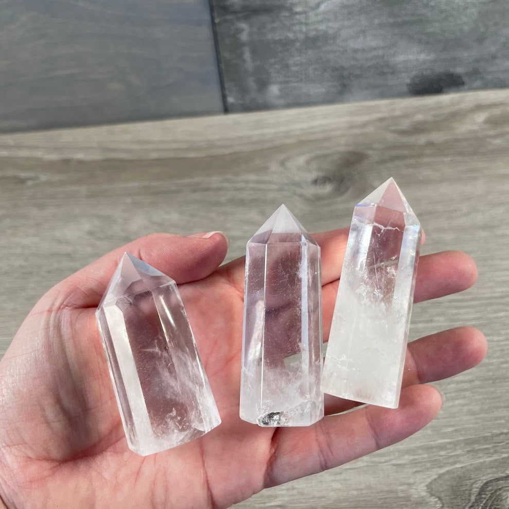 clear quartz natural gemstone obelisk points retail display