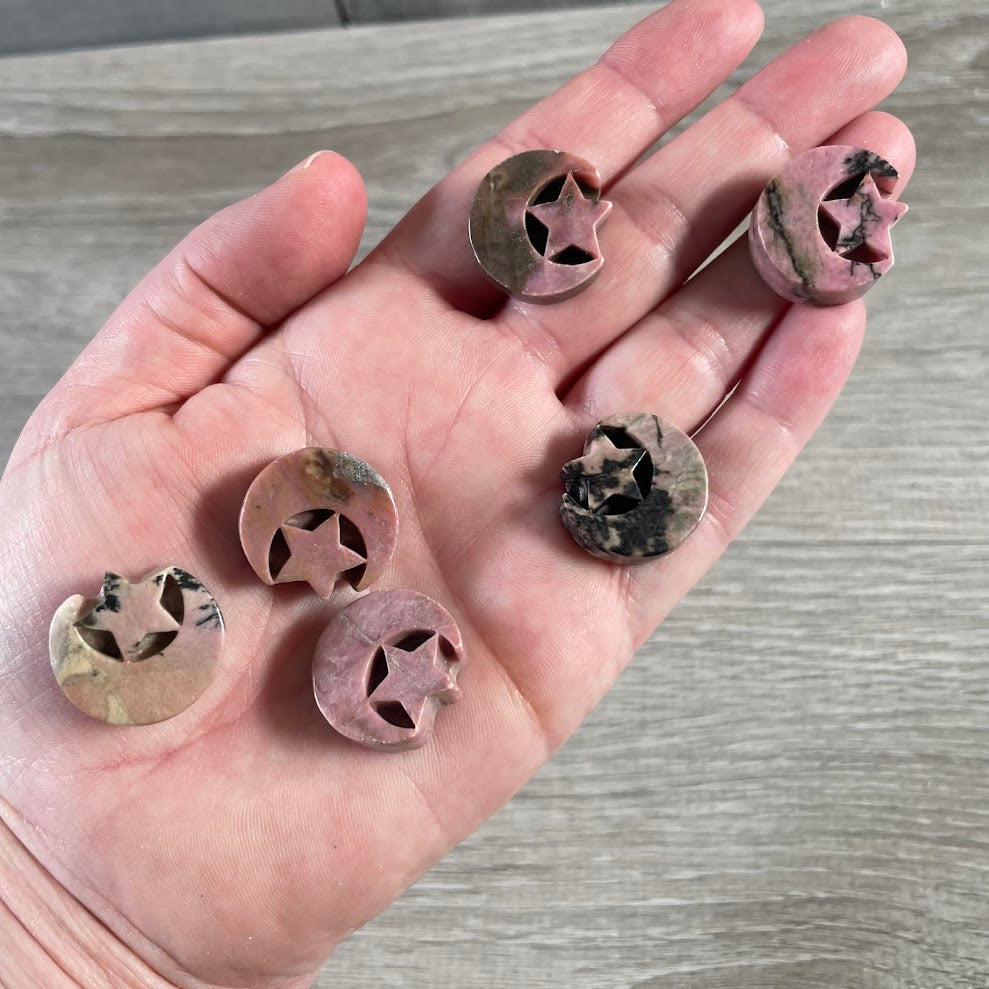 Wholesale Rhodonite moon and star crystal carving made from natural pink rhodonite gemstone.