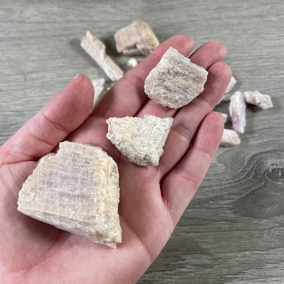 Natural kunzite crystal chunks in bulk