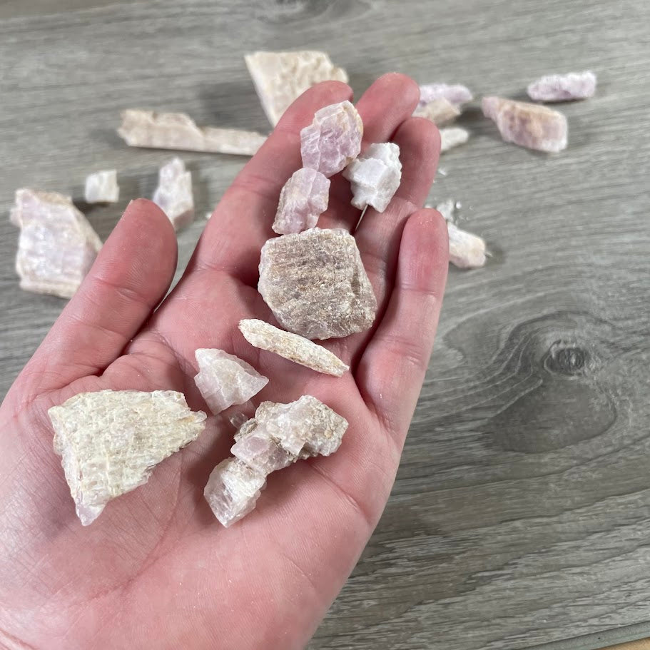 Natural kunzite crystal chunks in bulk