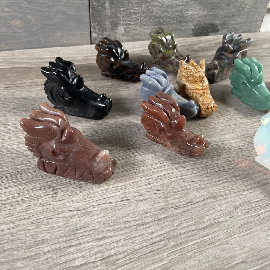 crystal dragon skulls in various gemstones