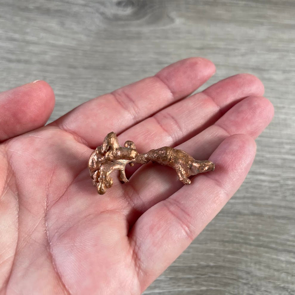 Raw native copper nuggets in assorted shapes for mineral collectors and retail displays