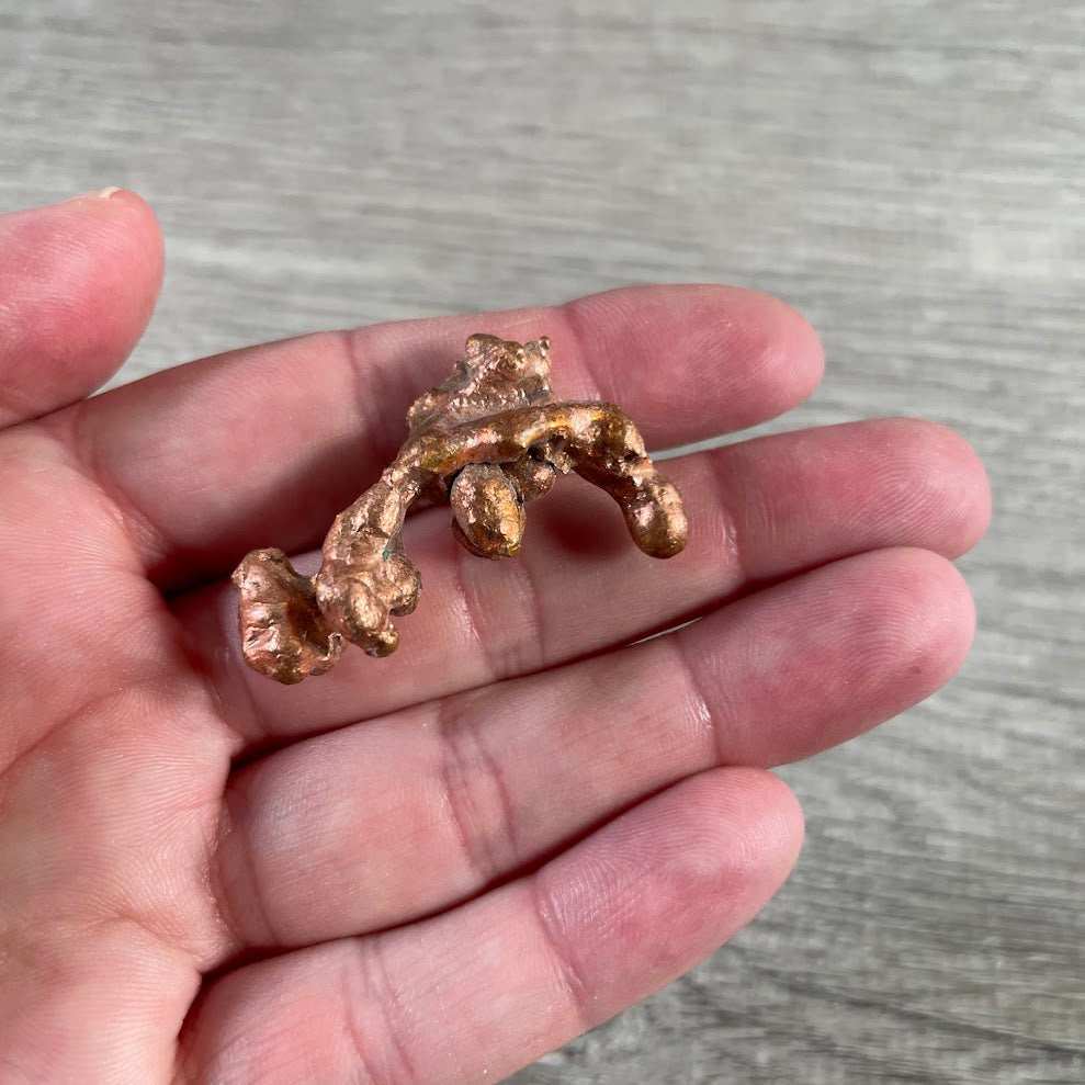 Natural raw copper mineral specimens with unique shapes and rustic copper tones