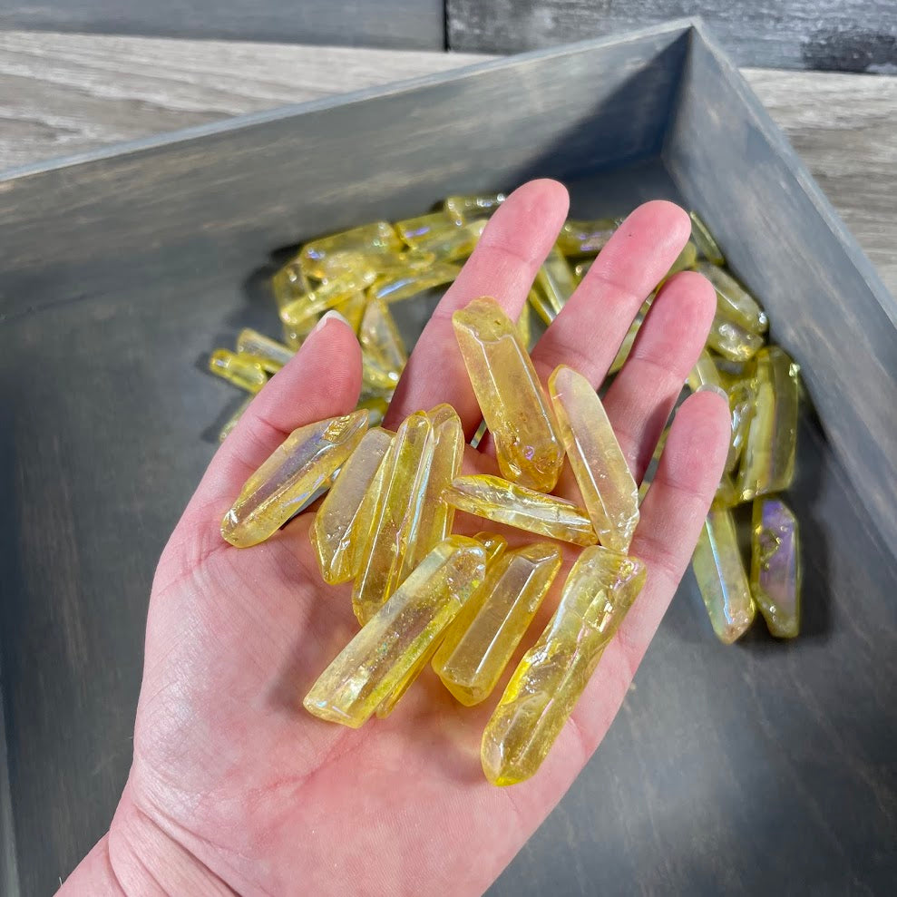 yellow aura treated crystal points sold by the 1 pound lot