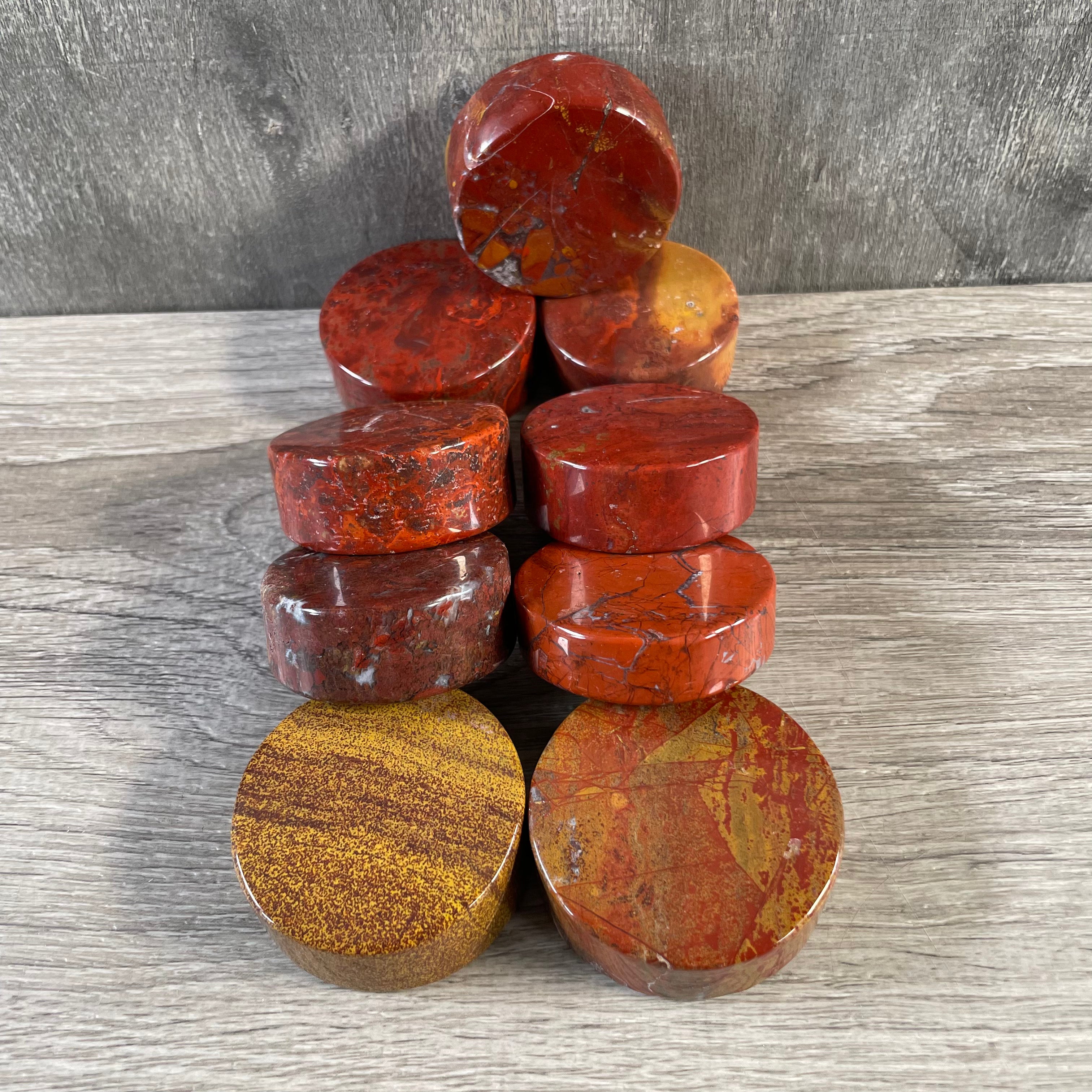 red jasper natural stone thick disk in polished finish for chakra layouts
