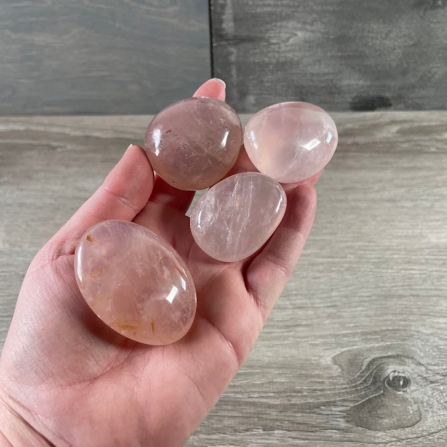 rose quartz palm stones by the ounce