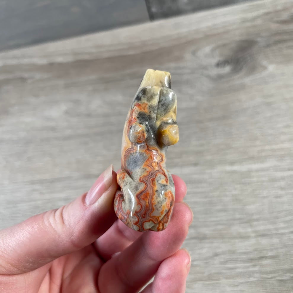 Medium assorted gemstone coyote figurine for rock shops, crystal stores, and gift boutiques