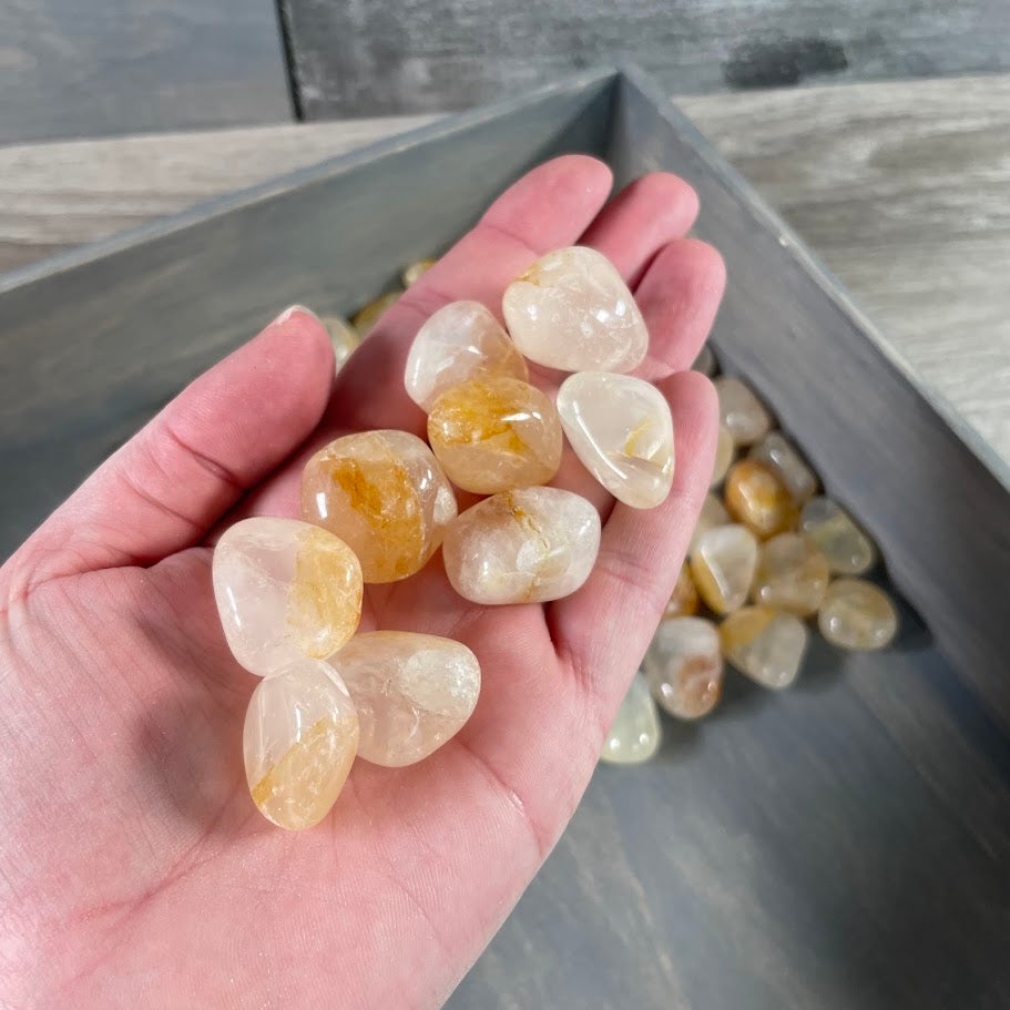 Polished Golden Healer Quartz stones in assorted sizes for metaphysical shops