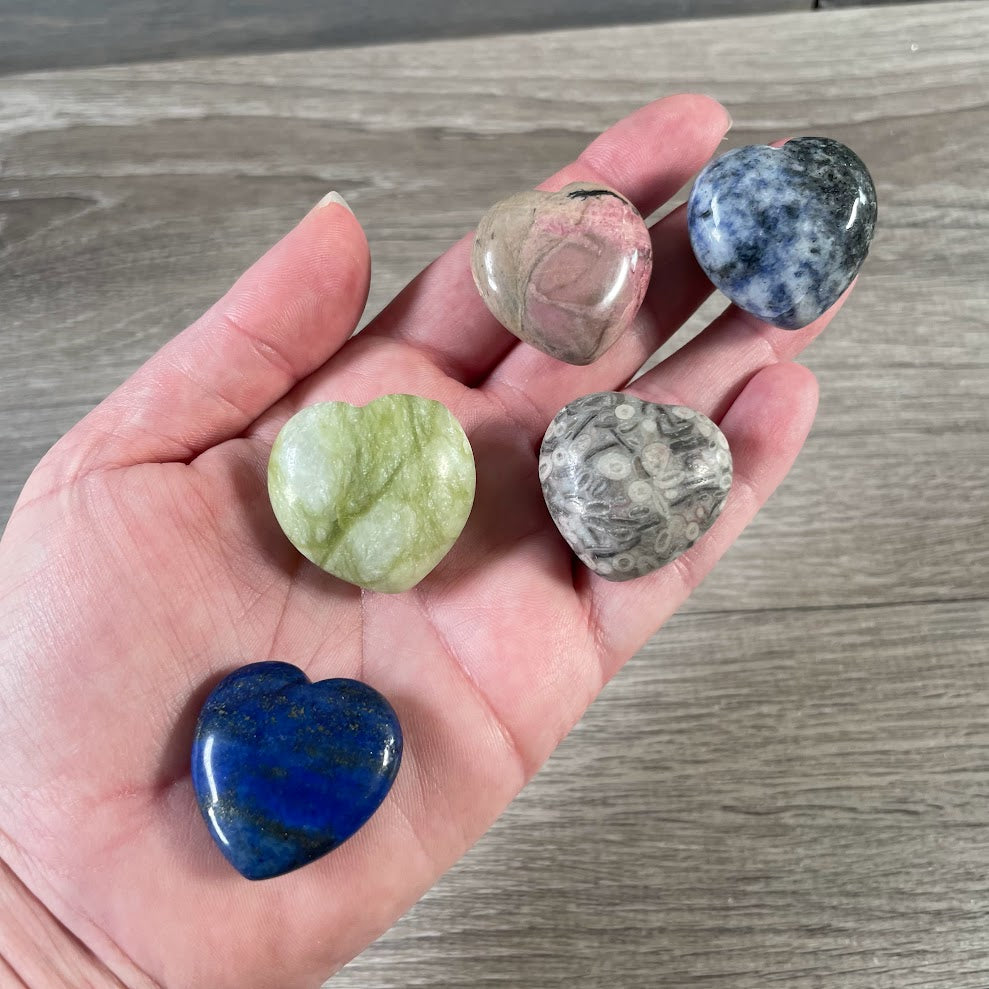 Bulk polished gemstone heart pocket stones in mixed colors and natural patterns