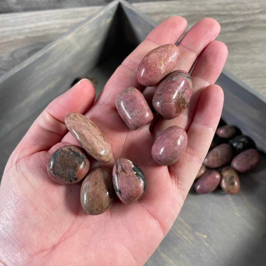 pink and black rhodonite healing crystals for spiritual shops