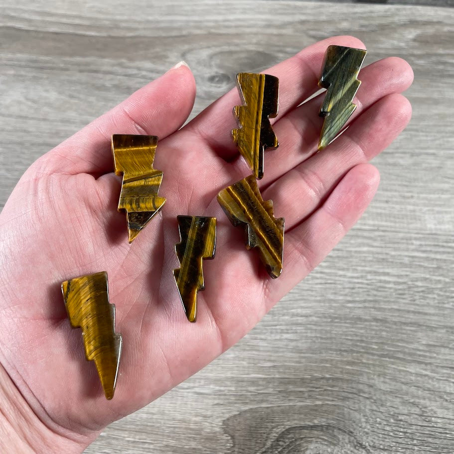 tiger eye gemstone energy symbol lightning bolt carvings ideal for new age shops