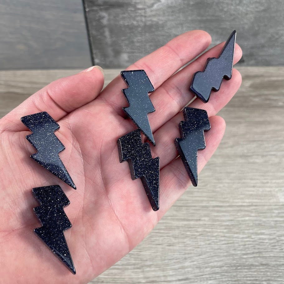 Blue Goldstone Detailed crystal lightning bolt carving for spiritual décor and gifts