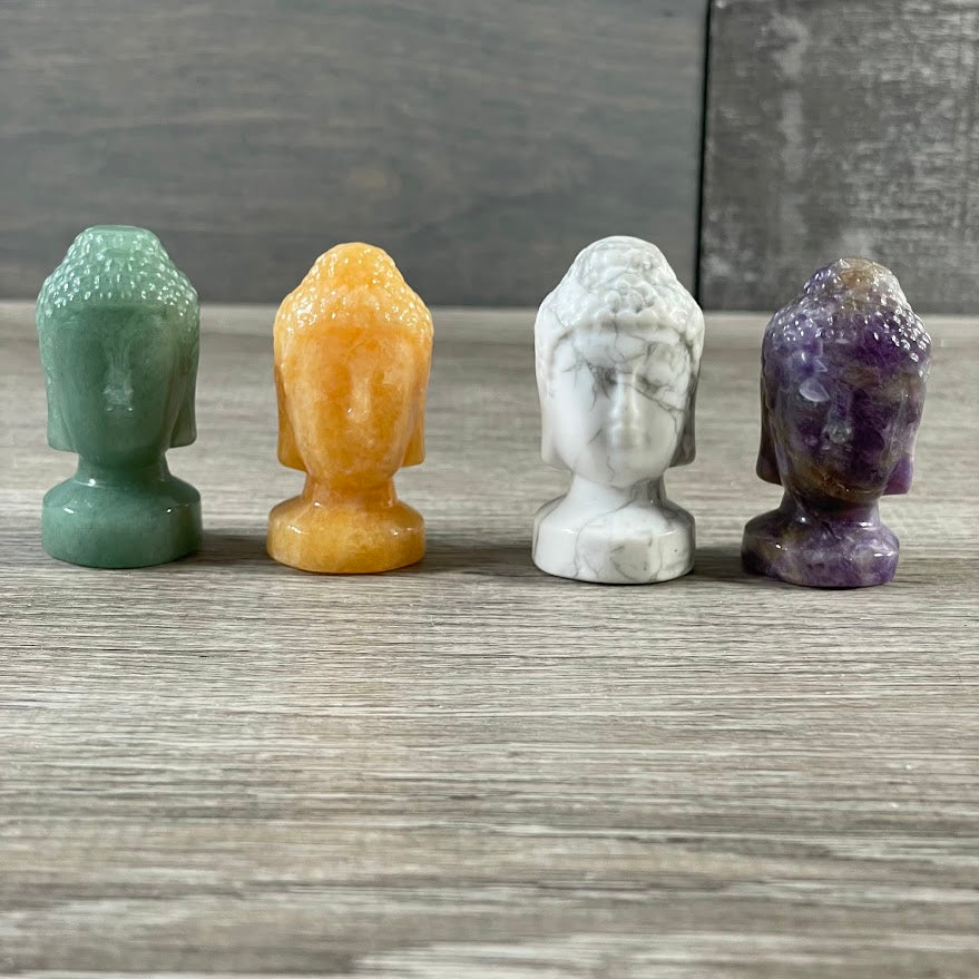 Medium carved stone Buddha head figurine for gift shops