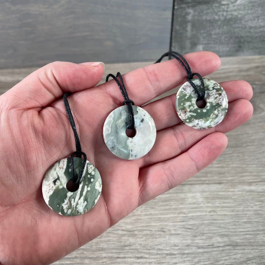 peace jade gemstone donut necklace pendant for metaphysical store display