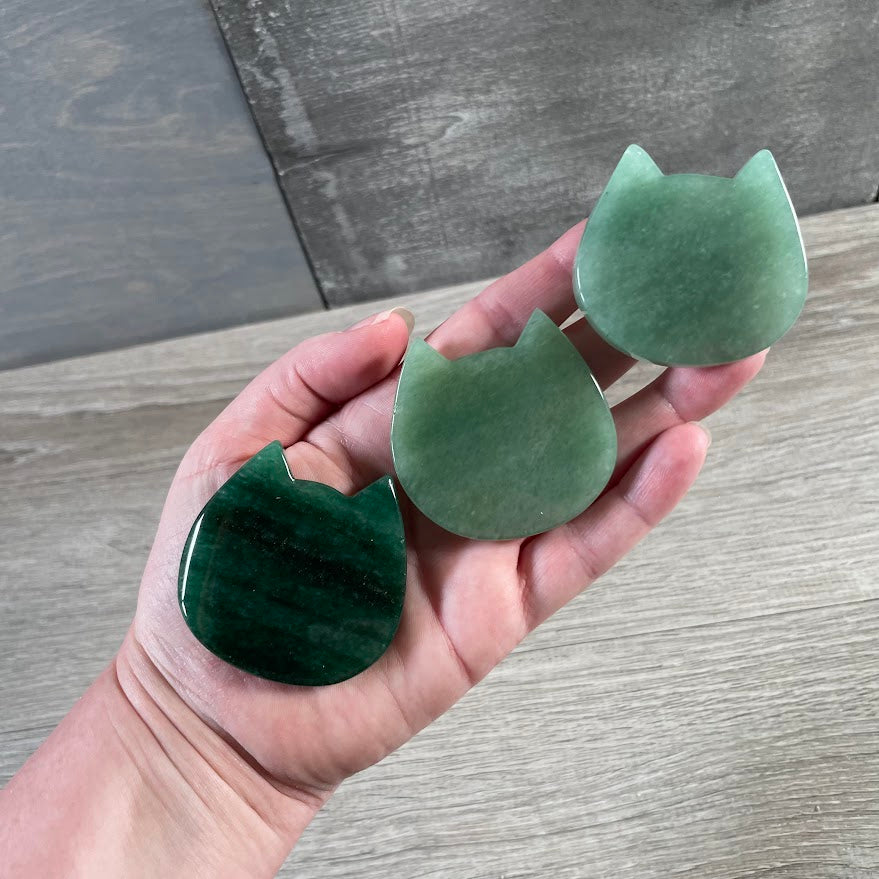 Aventurine Cat face gemstone carving displayed as a wholesale crystal gift item
