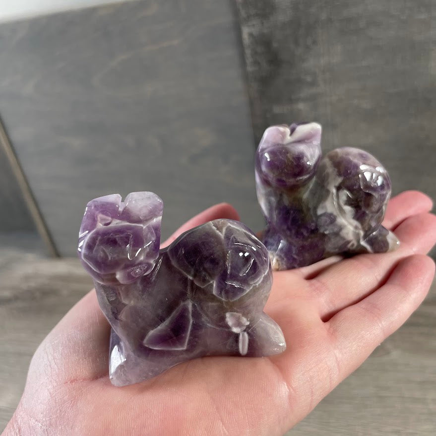 Amethyst snail carved figurines made from polished crystal for gift shops