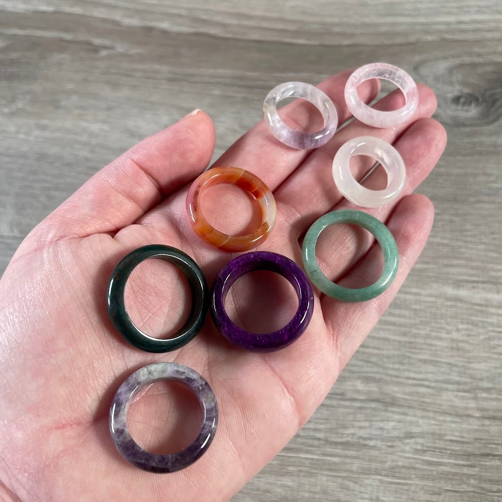 Colorful assorted gemstone rings for gift shop and crystal shop displays
