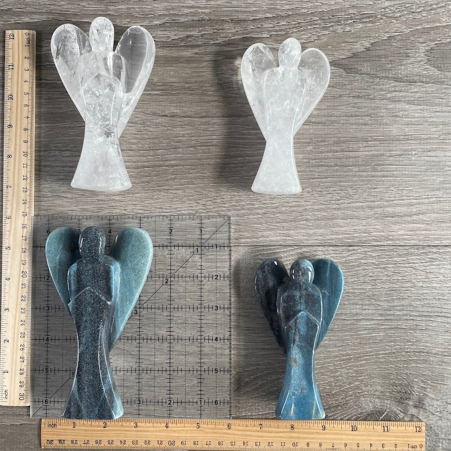 Carved crystal angel figurines for new age stores
