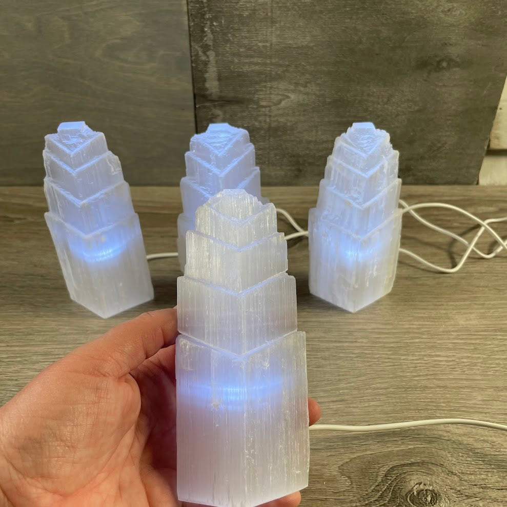 healing crystal selenite lamp illuminated