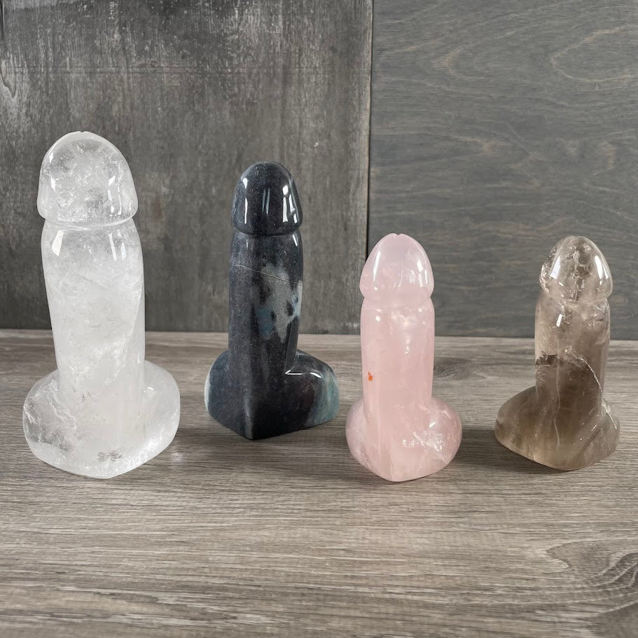 Four front-side standing gemstone penis's: 1 quartz, 1 smoky quartz, 1 trollite, 1 rose quartz.