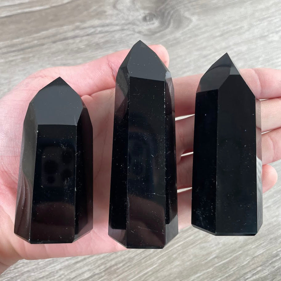 obsidian polished gemstone point from Brazil for metaphysical stores